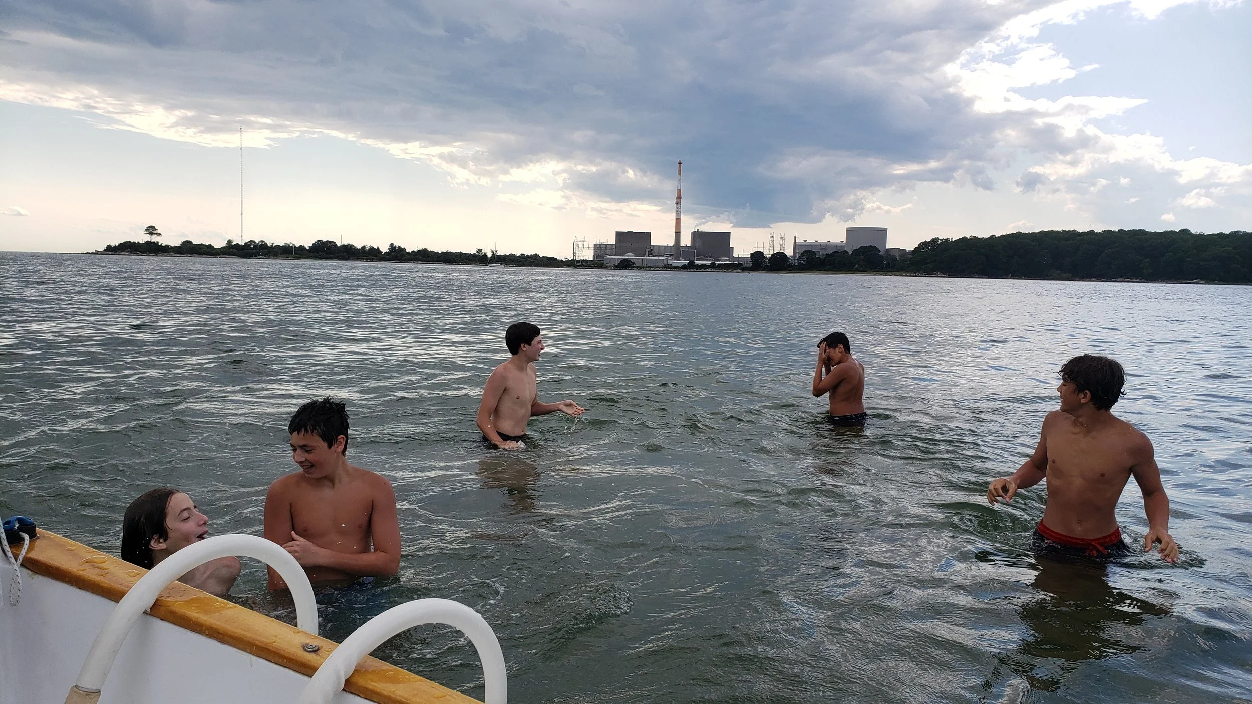 We sailed around Millstone Point to Jordan Cove where we anchored in shallow water and went swimming. Everybody had a fun time.