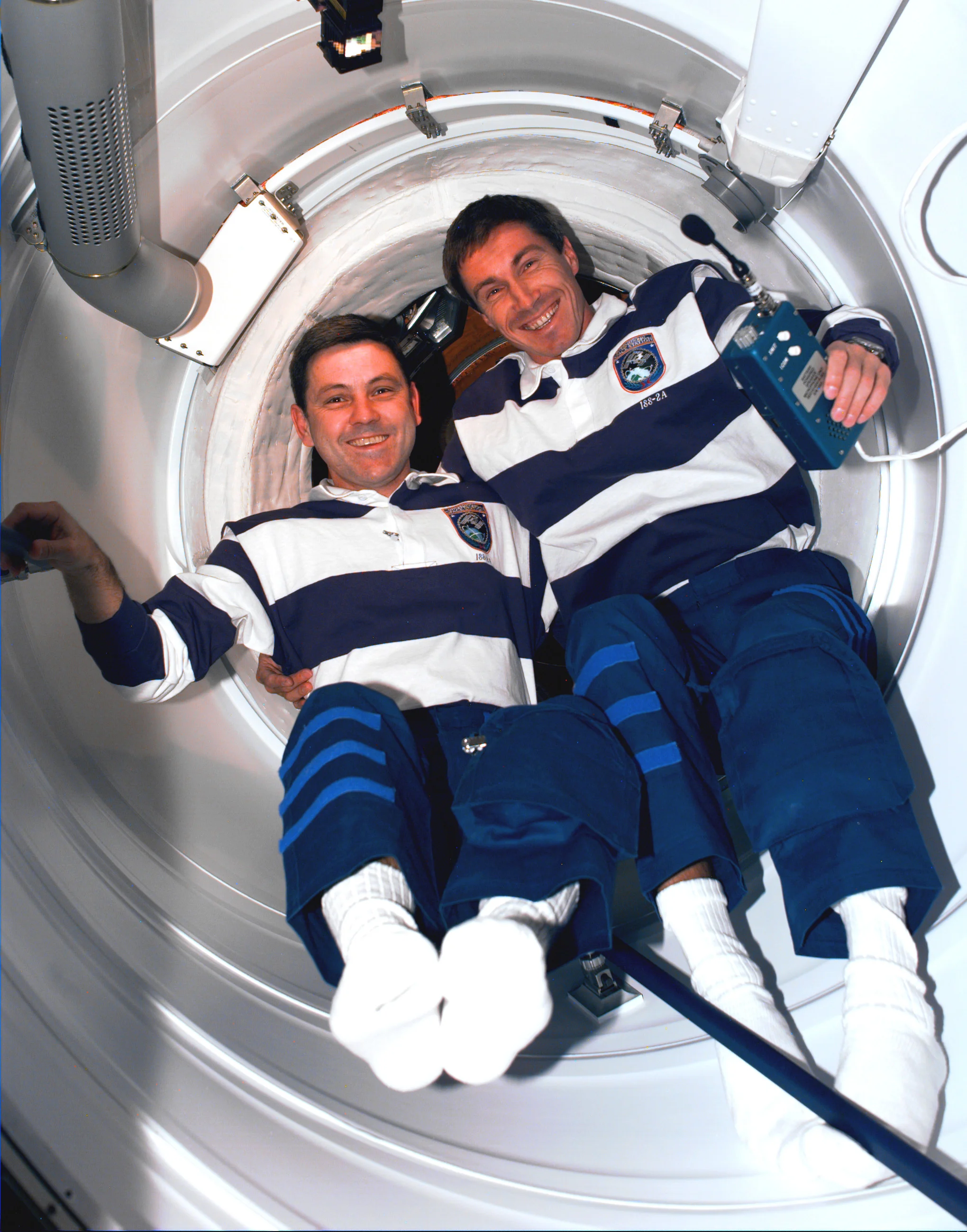 Astronaut Bob Cabana (left) and Cosmonaut Sergei Krikalev were the first people to enter the embryonic station in December 1998. Photo credit: NASA.