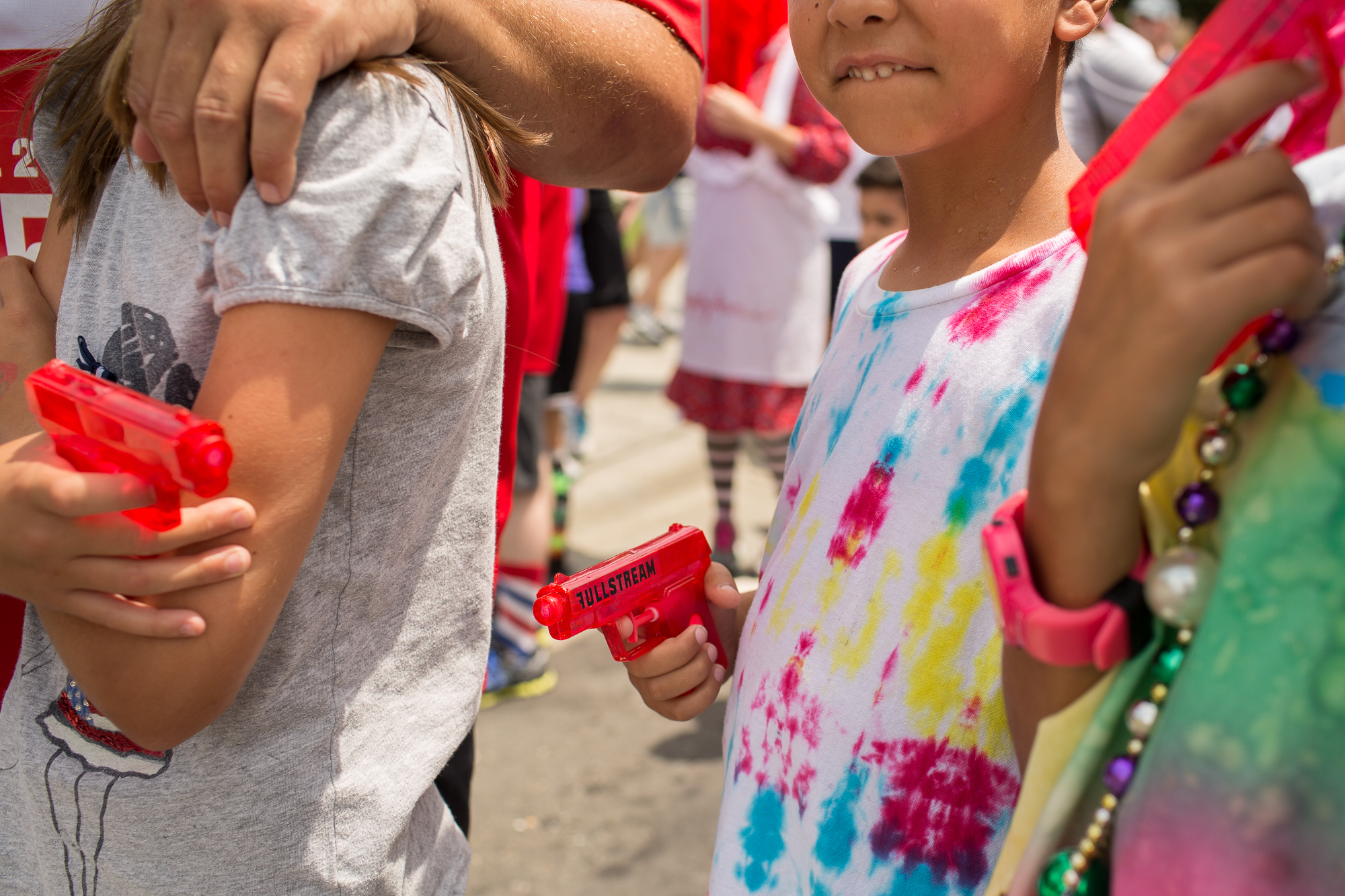  A squirt gun war breaks out before a foot race outside of Fullsteam Brewery at the edge of the gentrifying Cleveland-Holloway and Old Five Points neighborhoods in Northeast Central Durham. After a first wave of reinvestment by the City and developer