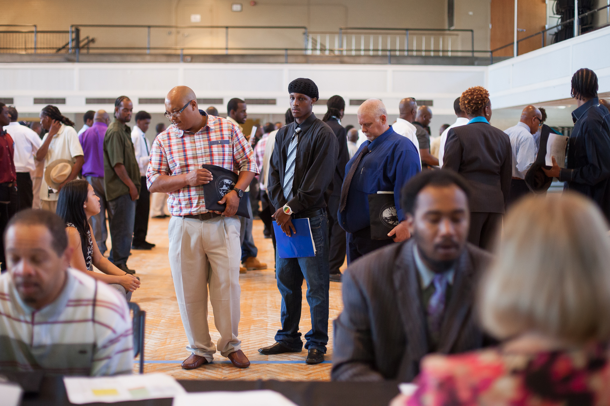  Rashard Johnson waits to interview at a Durham job fair that helps felons, the recently incarcerated and others with a criminal record to find employment. Rashard served nine months in prison and a judge waived his restitution upon his release. He l