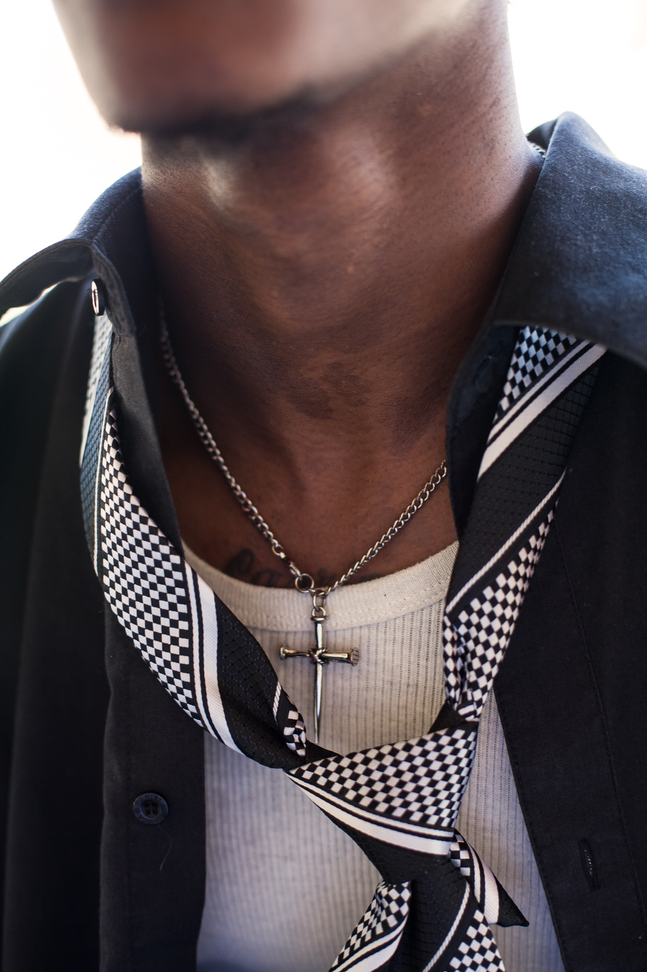  Rashard Johnson’s crucifix after a job fair for felons. In his lowest moments, Rashard finds refuge in his faith. 