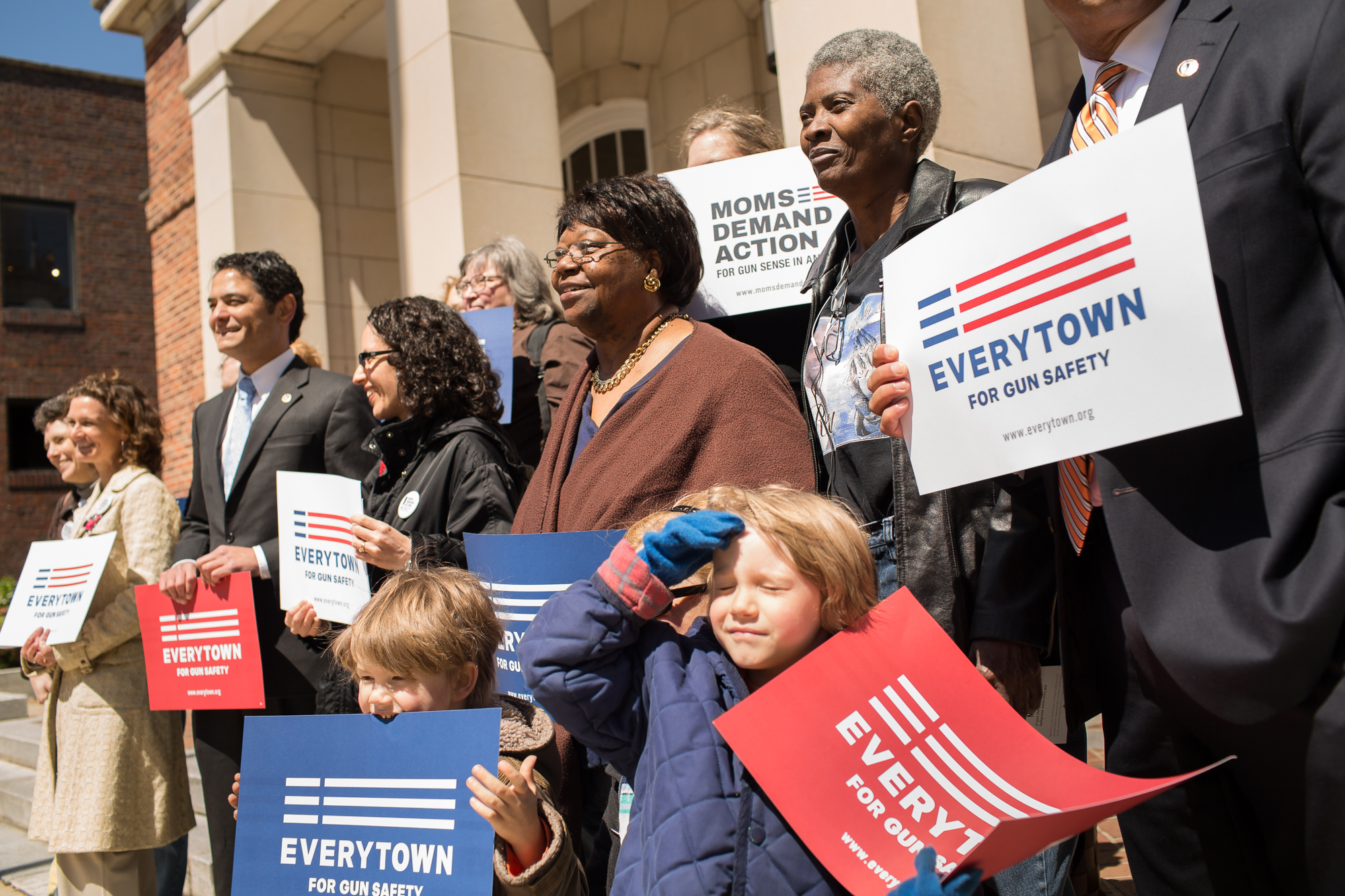  Joslin Simms poses with politicians and gun-control advocates after speaking at a Mayors Against Illegal Guns rally in Chapel Hill in 2014. Increasingly isolated by depression and grief, Joslin found companionship and community in organizations like