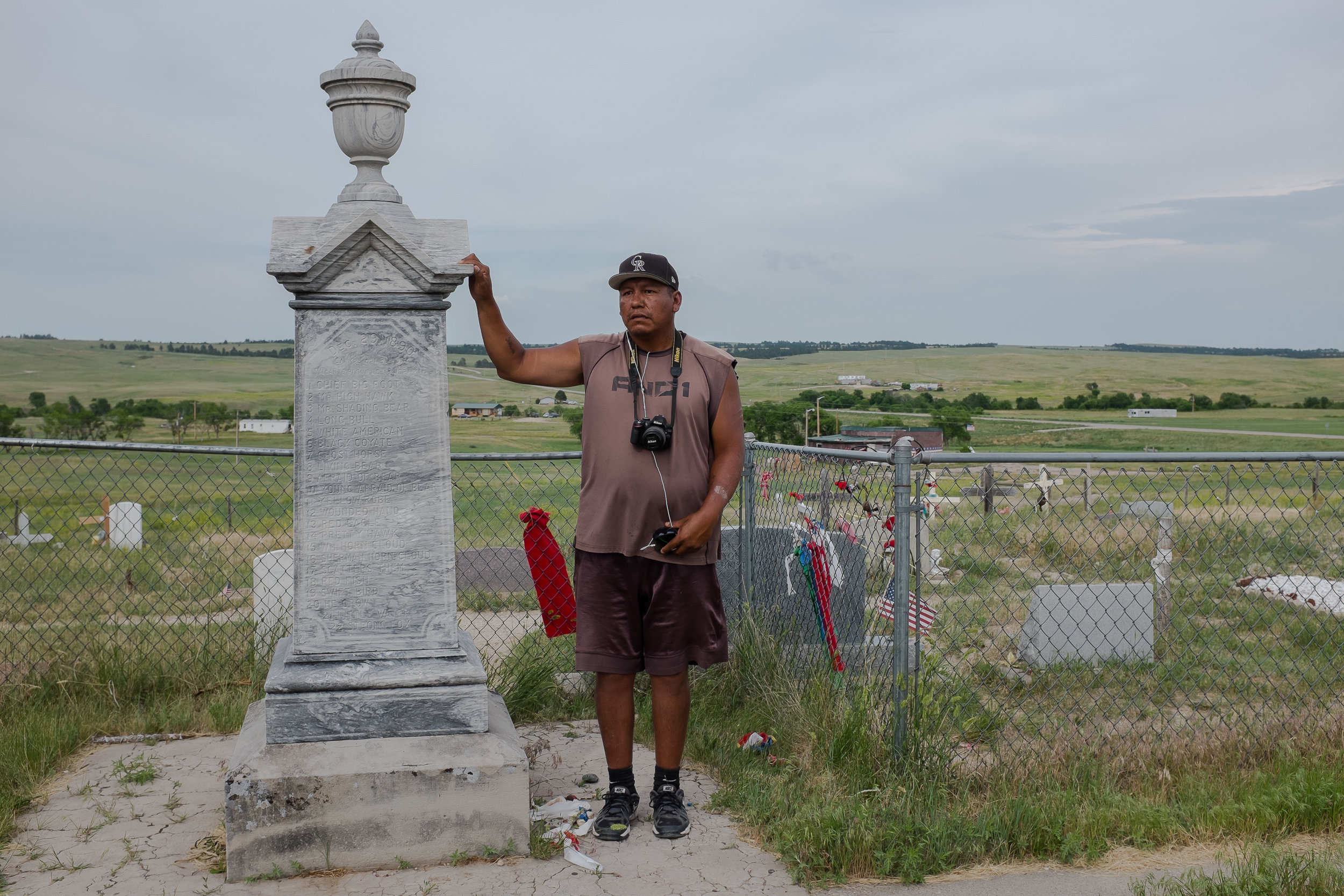  The mass grave on the Pine Ridge Reservation, Wounded Knee, South Dakota. In 1890, hundreds of unarmed Lakota men, women and children were massacred by the U.S. Army there and buried in a shallow mass grave. The soldiers were awarded the Medal of Ho