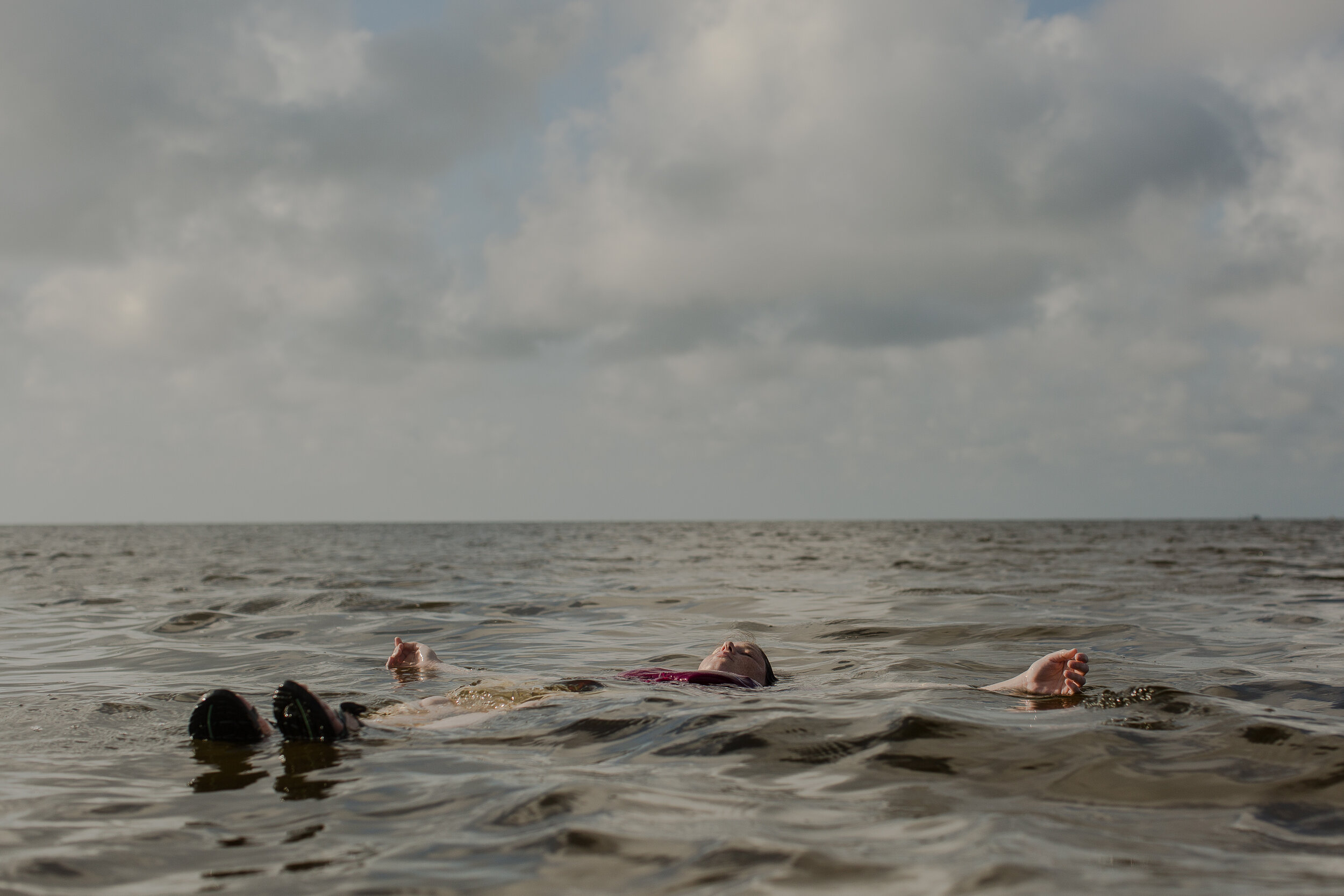  Katie from Michigan floats in in the Pamlico Sound. 