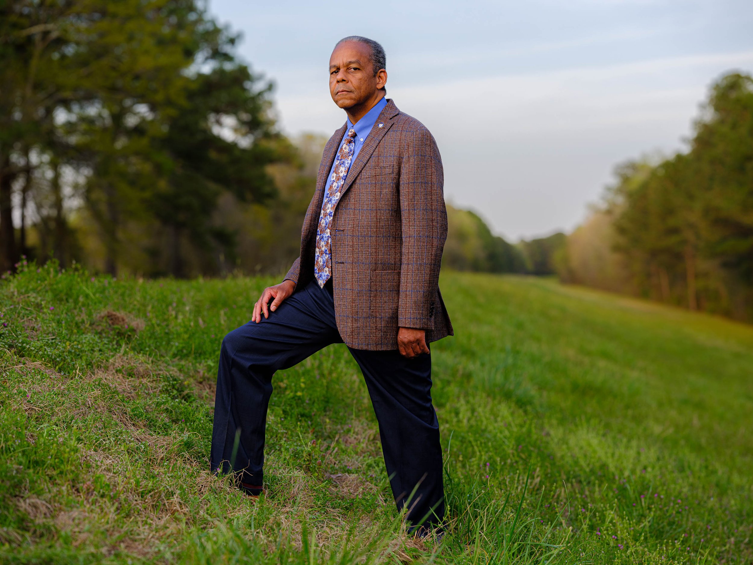  Bobbie Jones, mayor of Princeville, stands on the levee. Of Princeville's future, "racism cannot stop this," he said. From ORIGINS: Climate Change and Solutions in Princeville, North Carolina, America's Oldest Incorporated Black Town. 