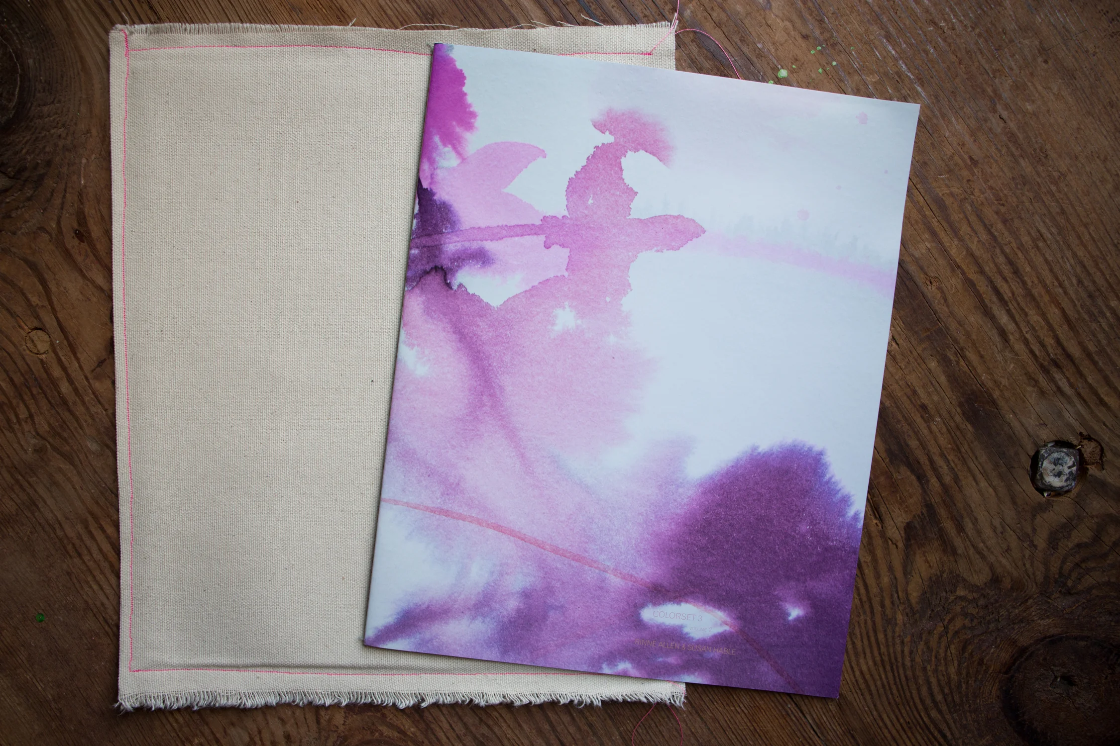 this book features a detail of a watercolor by susan hable and comes cased in a sewn canvas sleeve. inside the book are colorful glimpses & remnants found by rinne in susan's painting & design studio. below are a few spreads from the book, showing susan's working methods and how she plays with color.