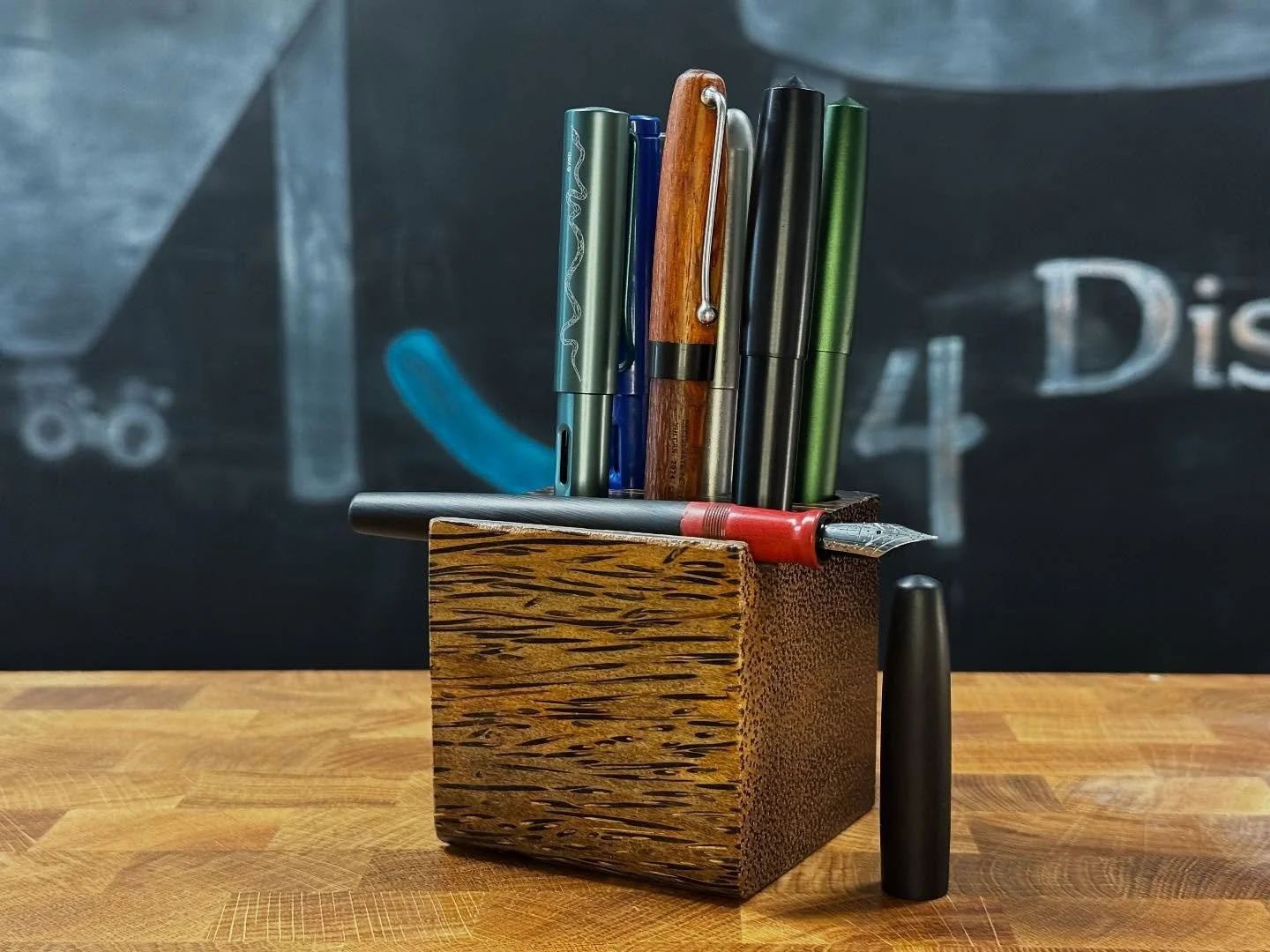 It&rsquo;s that time of year! Time to show off the haul from this year&rsquo;s @dcpenshow! Starting off with this handsome black palm pen block from our friends at @penquisition. A hefty and gorgeous piece of craftsmanship to keep my desk from lookin