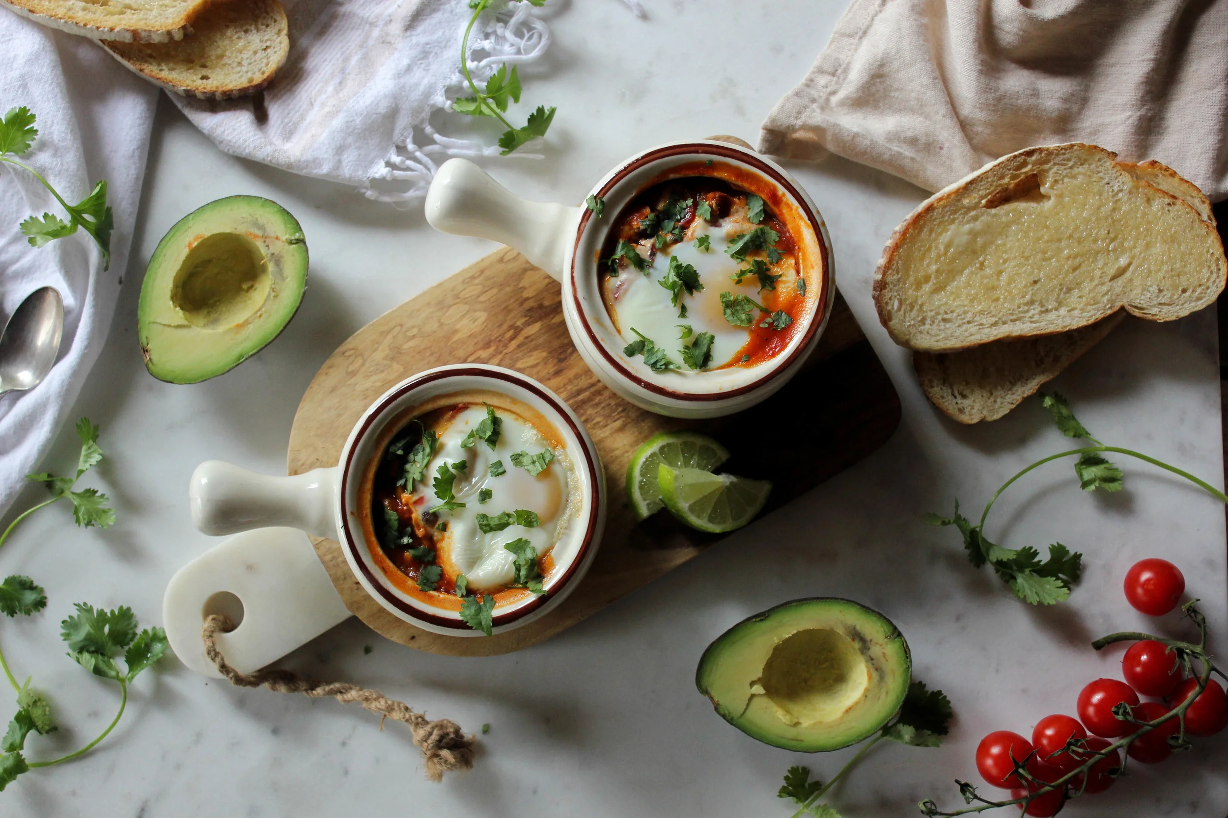 Baked Eggs on top of a Maple, Chipotle Black Bean Veggie Medley