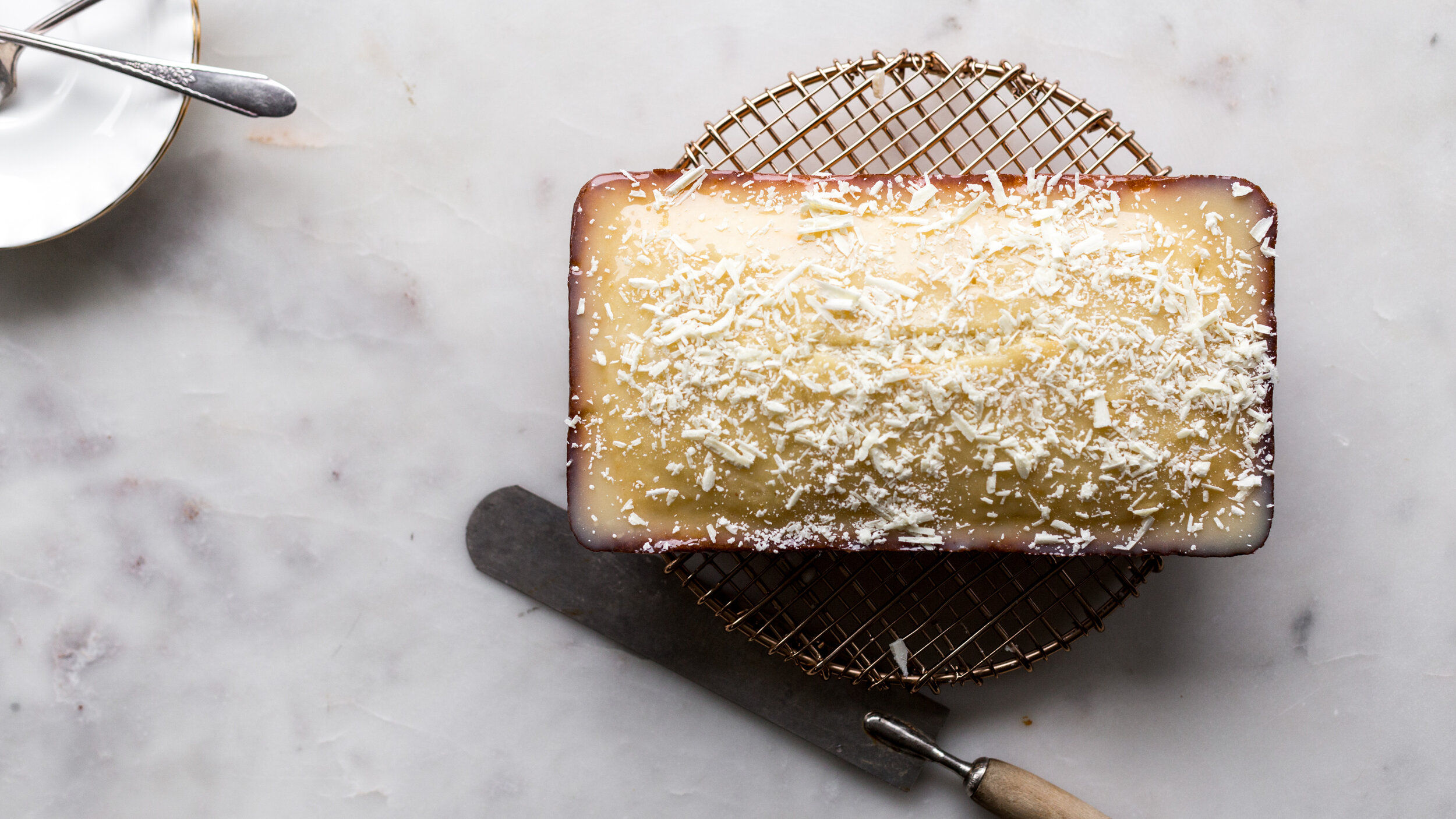 LEMON SYRUP SOAKED, WHITE CHOCOLATE POUND CAKE — L | E