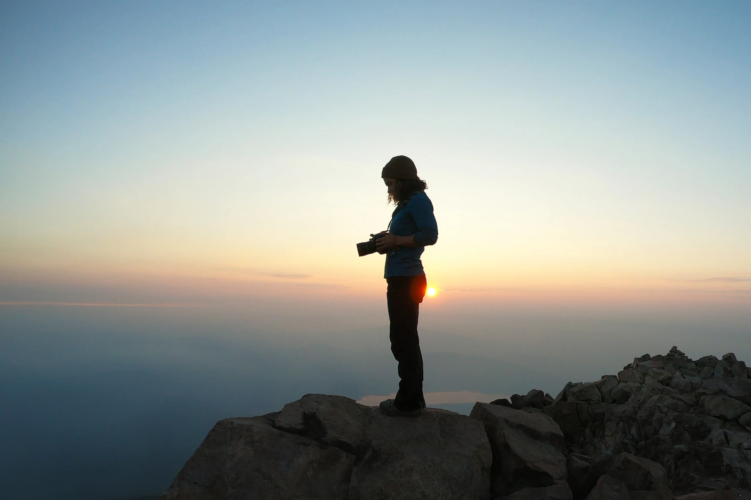 On the summit of Mt. McLoughlin as the sun rises on July 25, 2018.