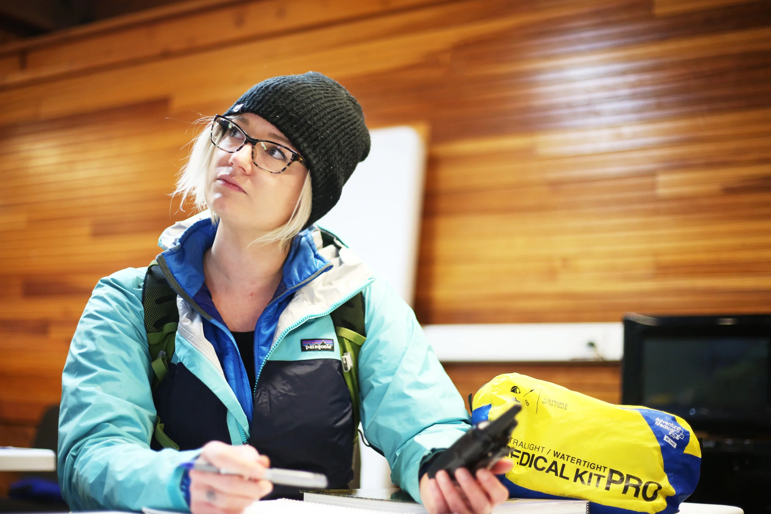 Set. Sara, acting as the Assistant Incident Commander, takes notes and waits for the distress call over the radio.