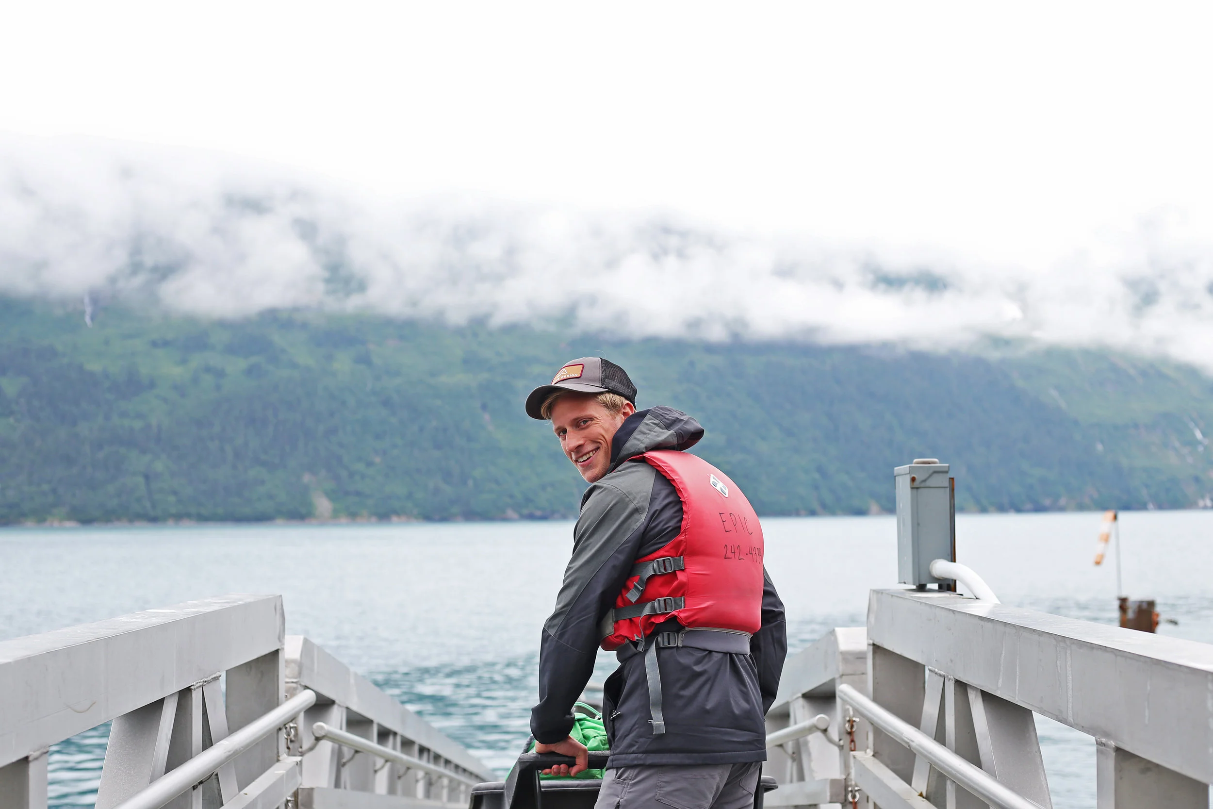 Nate transporting our gear from the car down to the dock.