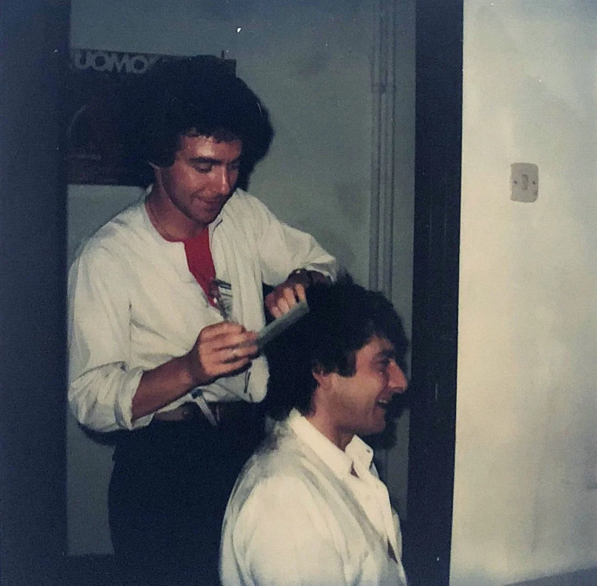 Michael cutting Aldo Coppola’s hair