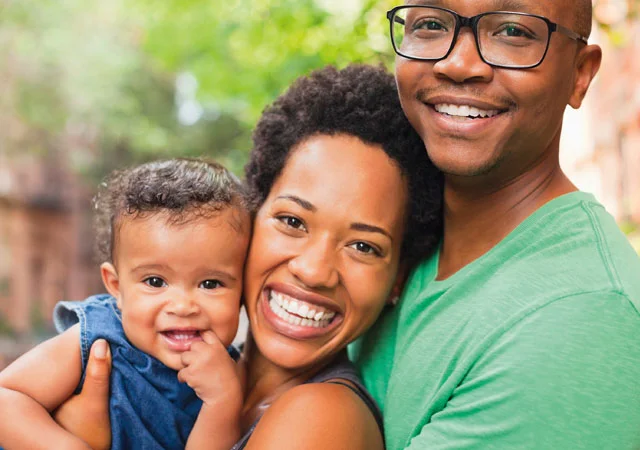 father-mother-baby-smiling-320w.jpg