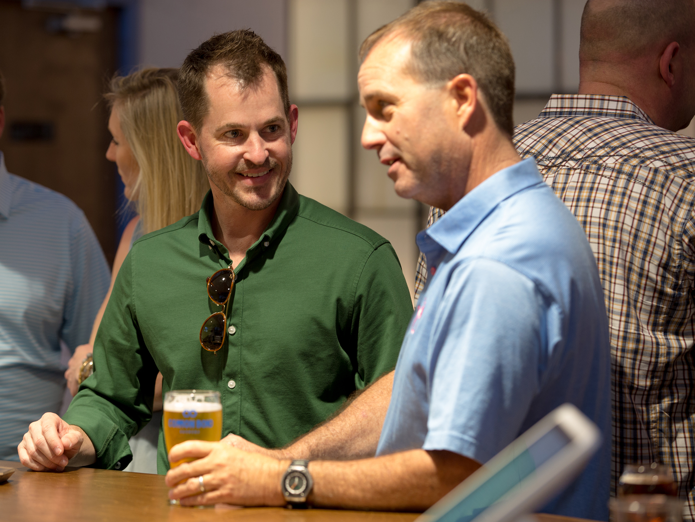 Guys enjoying a cold beer