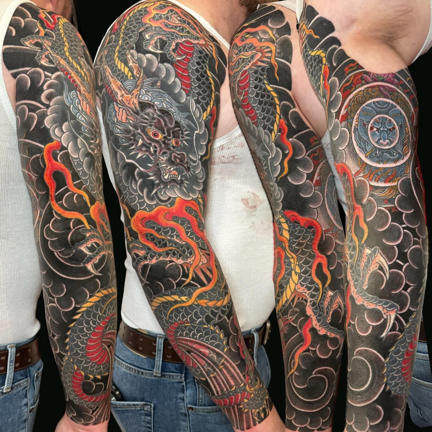Adam is one tough customer, 2 days in a row to complete this dragon Fudo sleeve.👉🏻swipe for video👈🏻 email jebmaykut@gmail.com for appointments 5 days a week @heartinhand_est . @elmstreettattoo