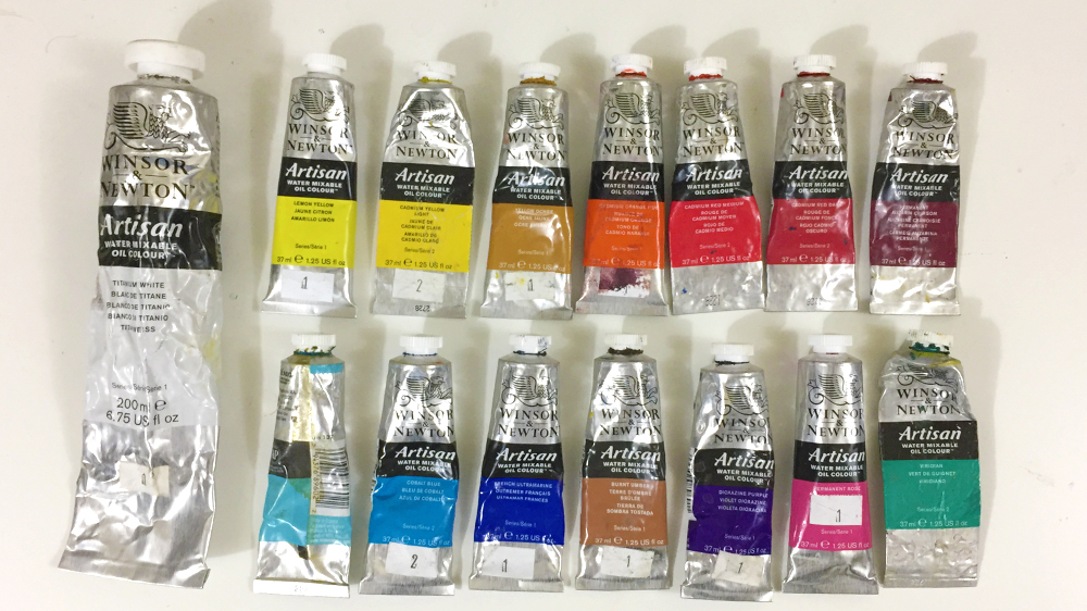 My Colors are arranged the same way I like to arrange them on my palette, basically is consist of a warm/cool version of each primary color with a few outliers that I could mix with my primaries, but since I use them so frequently it is time saving to just get them out of the tubes. Titanium White ( The best white) Lemon Yellow ( A more subtle and warm yellow) Cadmium yellow Light ( The only yellow I really need) Yellow Ochre ( This one is often left off my palette) Cadmium Orange ( A shortcut color, I can mix this easily but I use it so often) Cadmium Red Medium ( The warmer of the cad reds) Cadmium Red Dark ( The cooler of the cad reds) Alizarin Crimson ( A must have on any palette) Cerulean Blue ( The warmest Blue) Cobalt Blue (A cooler Blue) Ultramarine Blue ( A standard for painting) Burnt Umber ( A great shortcut color, but i dont use it often) Dioxazine Purple ( a great purple for mixing into shadows) Permanent Rose ( I dont use this color much) Viridian ( Great for mixing greens) It is also worth noting that I use Windsor and Newton Artisan water soluble oils, I do not plan on using these paints forever but for now they are affordable and I have no problems with the quality.
