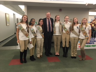 From left to right: Maddie, Anusha, Caroline, Mayor Martin, Helena, Cece, Lilly, and Elizabeth