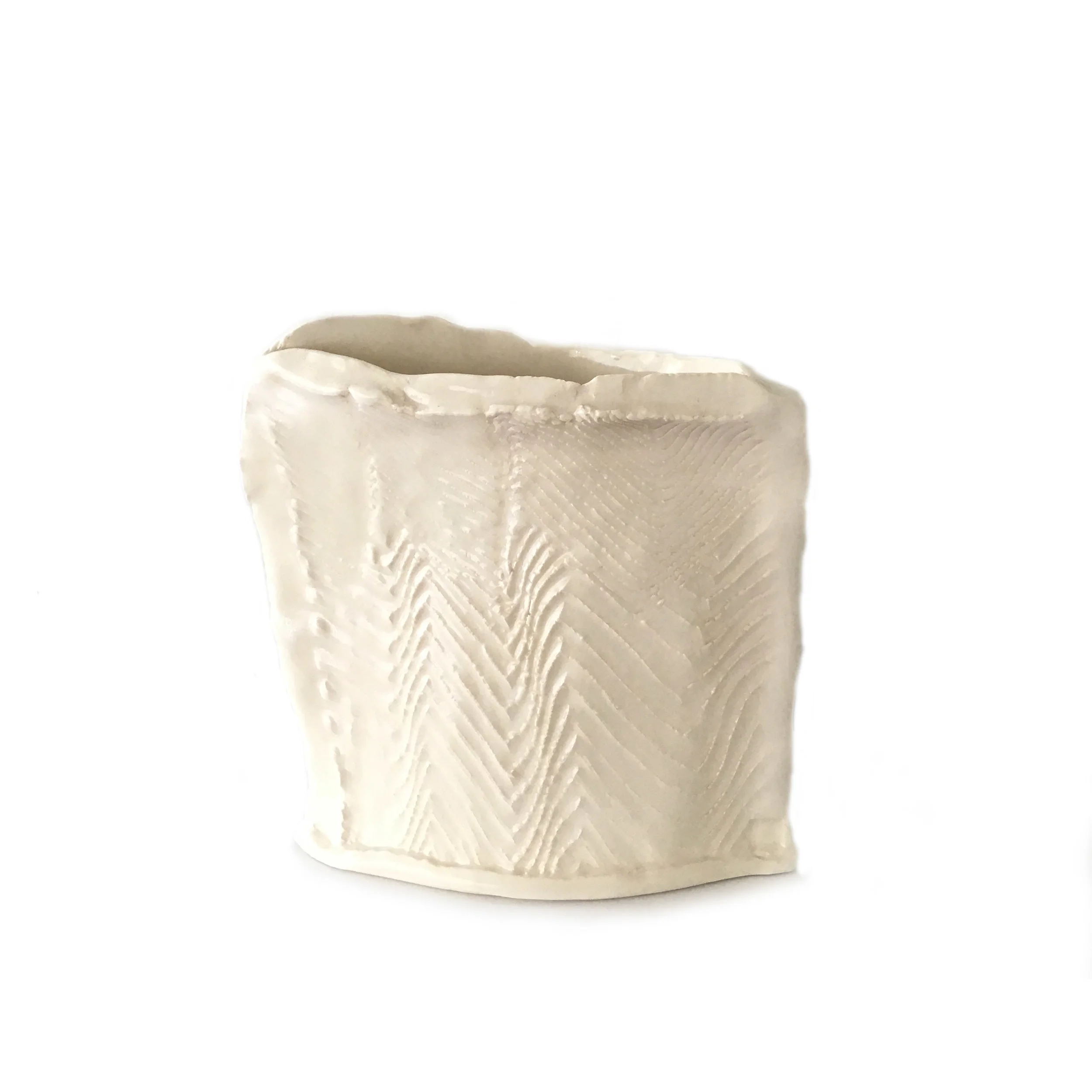 Vase, white earthenware clay, $79 Available to view at both locations