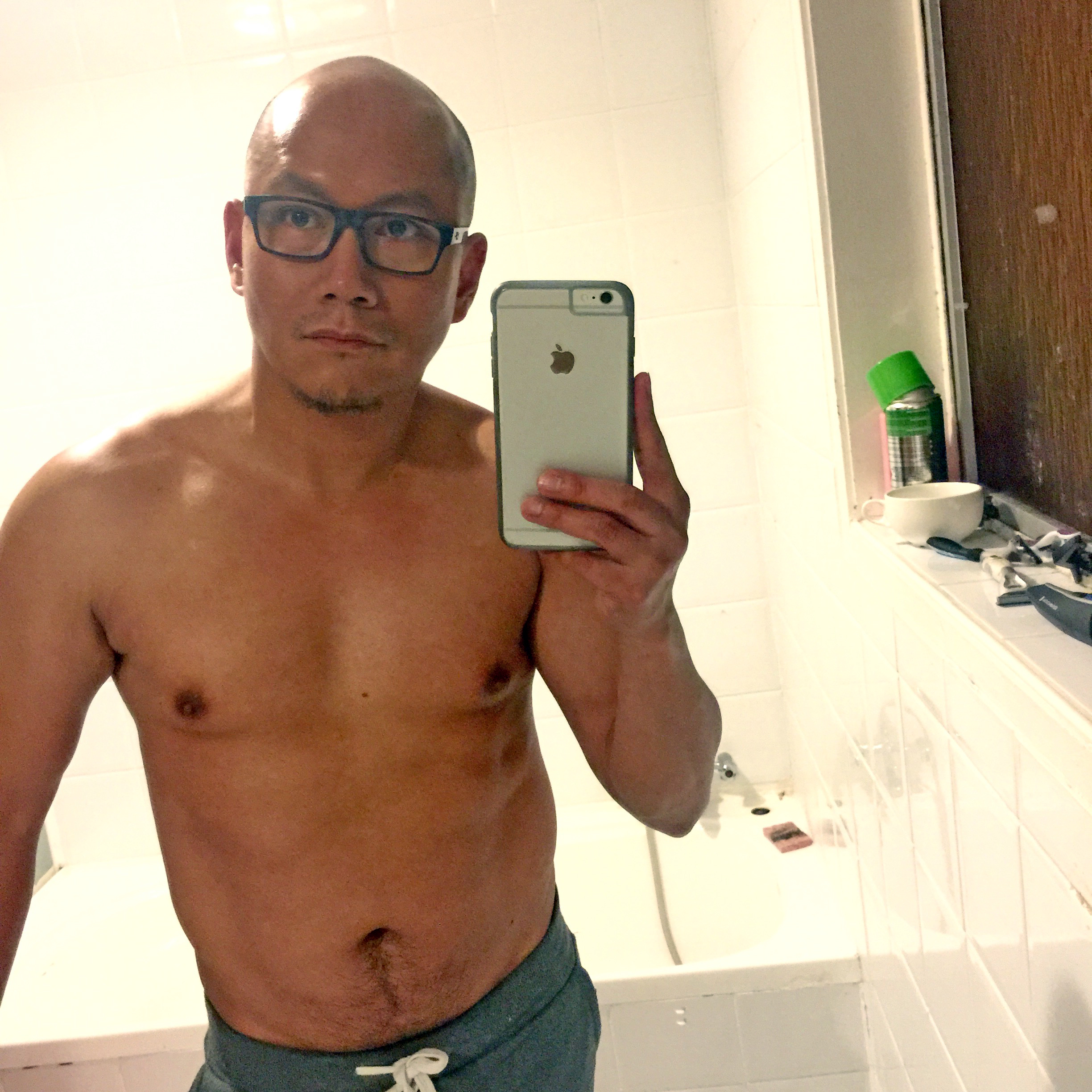 Shirtless selfie because I need to know if I'm getting fat or something. Sometimes you can't rely on a mirror. This is the old bathroom in Papakura.