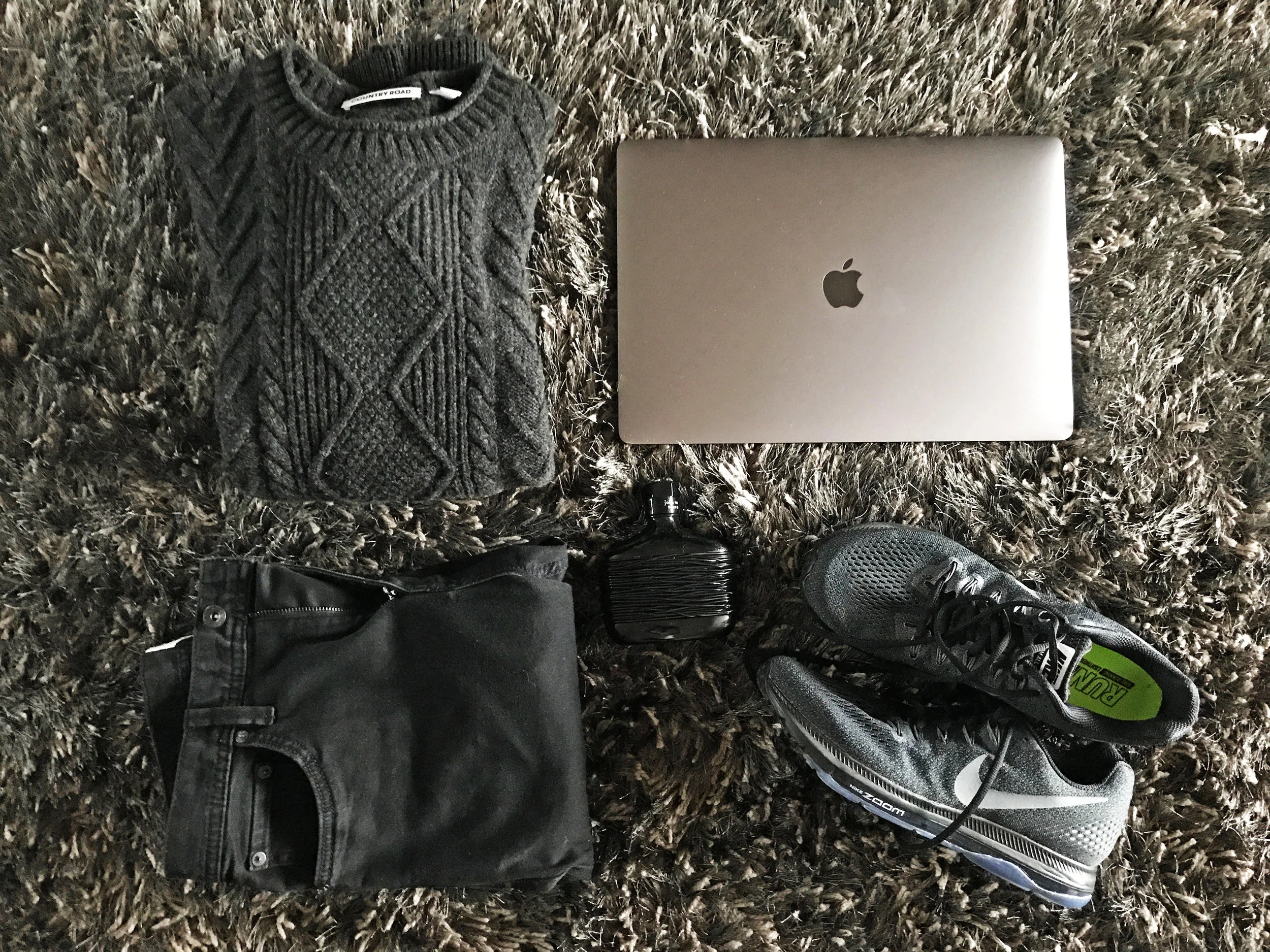Country Road Wool Cable Knit Crew in black; the new MacBook Pro 15-inch (space grey which is almost black in person lol) with Touch Bar & Touch ID; Nike Zoom All Out Low in black/anthracite; John Varvatos Dark Rebel cologne; Country Road Slim Tapered Black Jean; Kmart shag-carpet in black and silver. 