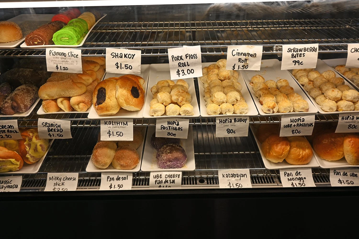 dosena bakery cabinet goodies.jpg