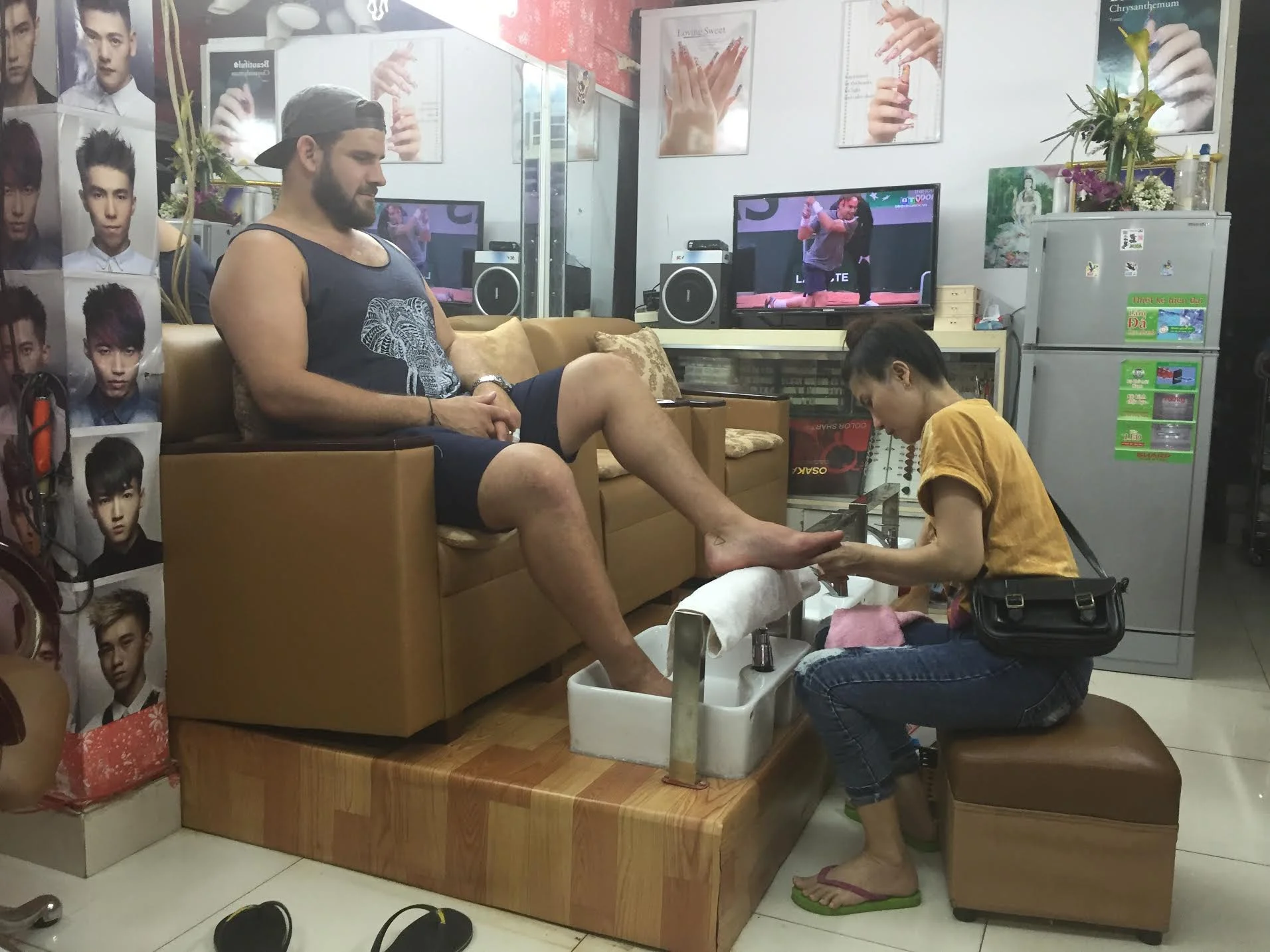 Rob having a celebratory $1 pedicure (he'll kill me for this ;) )