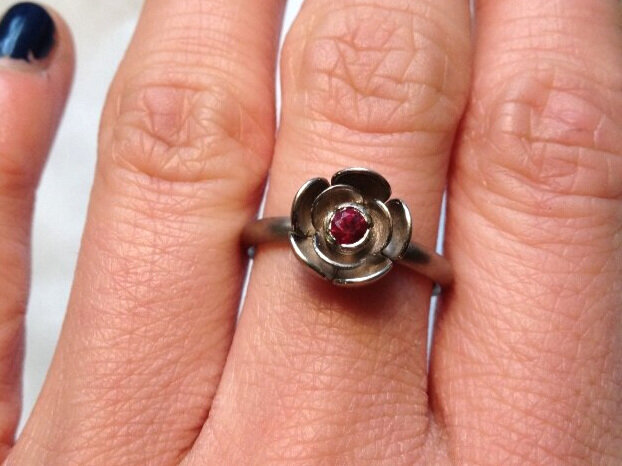 18ct white gold rose flower bespoke engagement ring with ruby