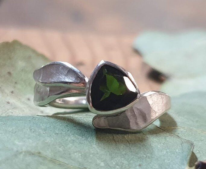 bespoke engagement ring trillion cut green tourmaline set in silver petals