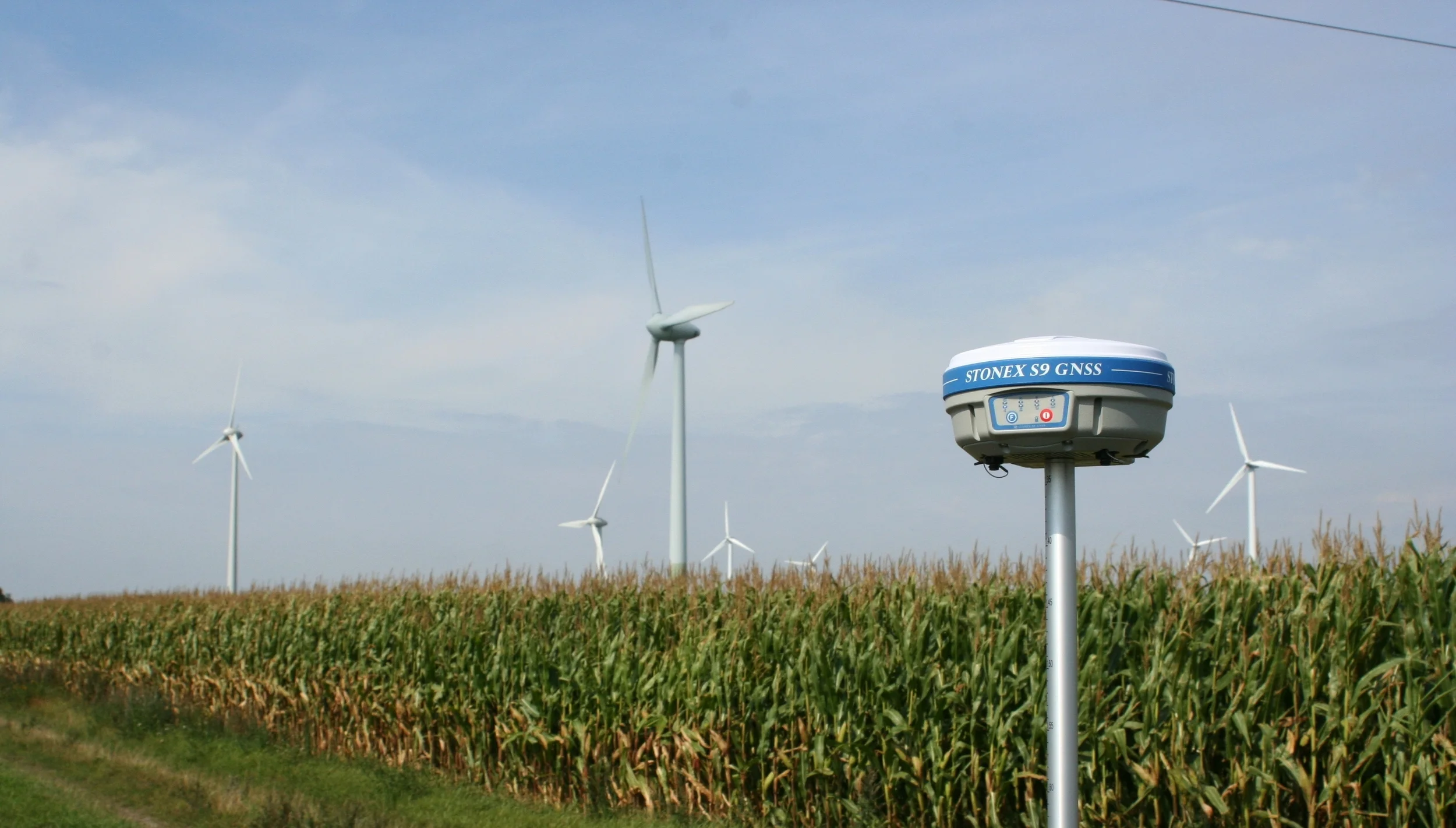 Stonex-S9-GPS-GNSS-RTK-Base-Station-in-a-cornfield.jpg