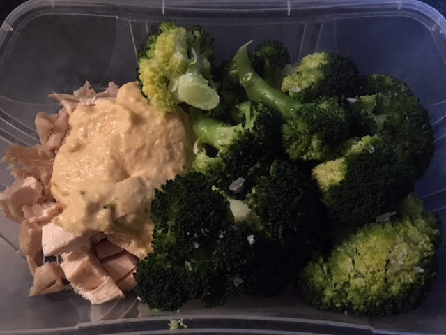 Chicken fillet with homemade hummus and broccoli