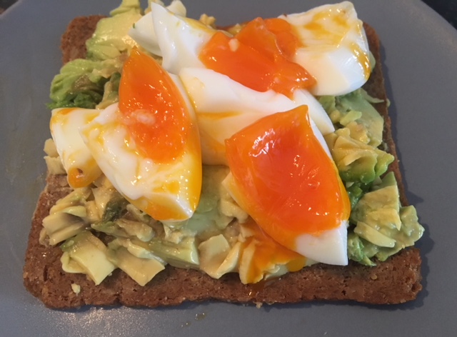 Sunflower and rice bread with avocado and egg