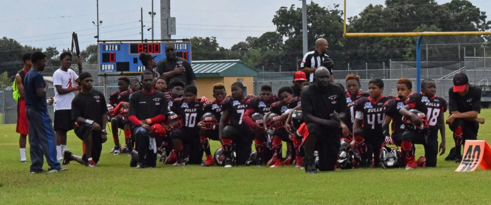 The Beaumont Bulls youth football team knelt during the national anthem before a Peewee football game and had their season suspended for their peaceful protest. (Image: ABC News)