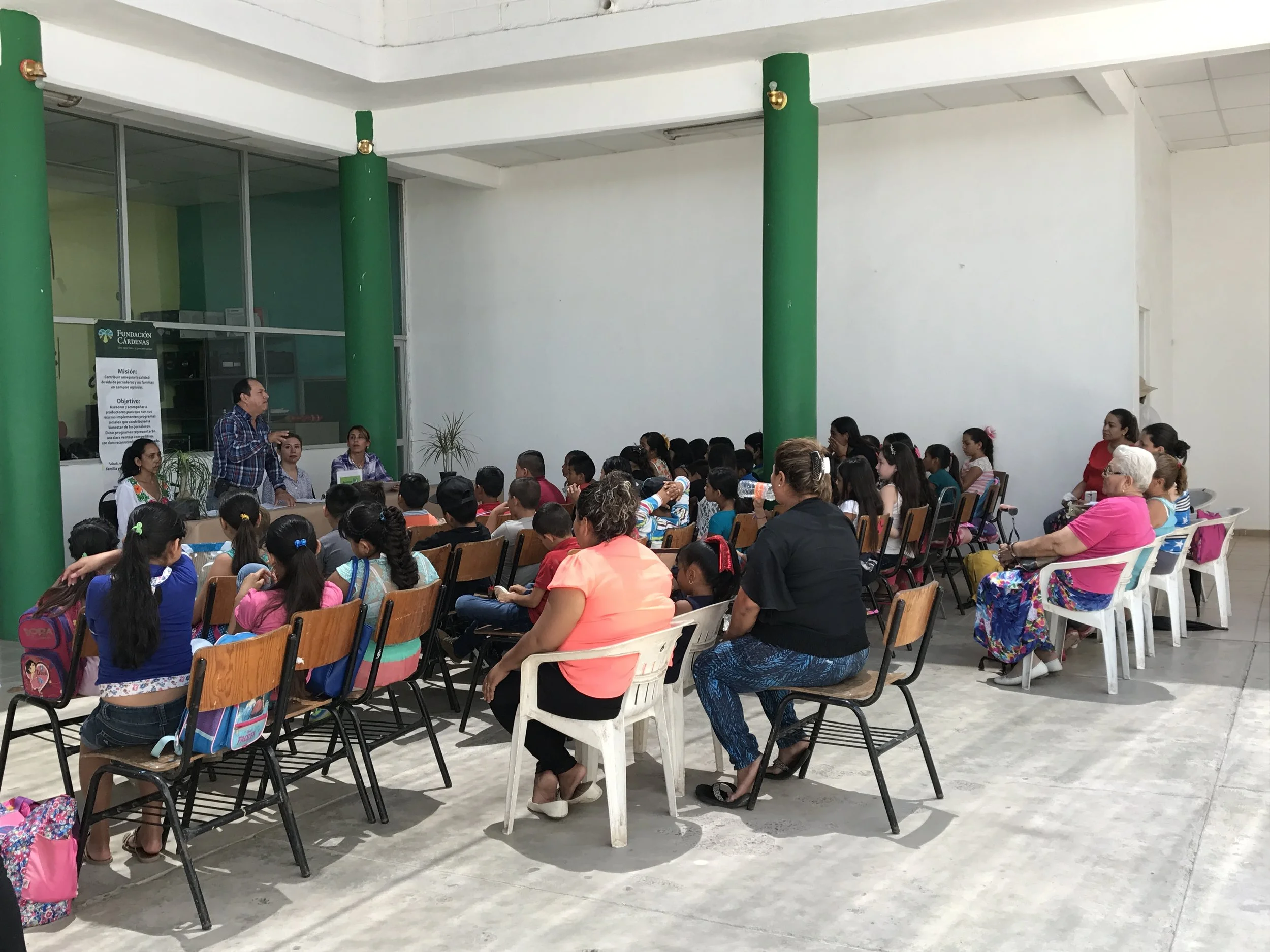Students wait to receive their diploma for attending Villa Juárez’s first summer program for children. (Photo: Elizabeth Moedano)