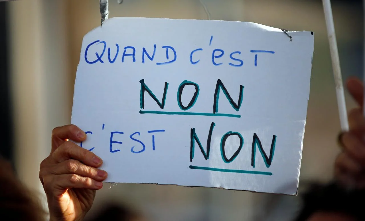 "No means no" sign at French protest. (Euronews)