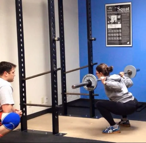 Nicole learning to squat