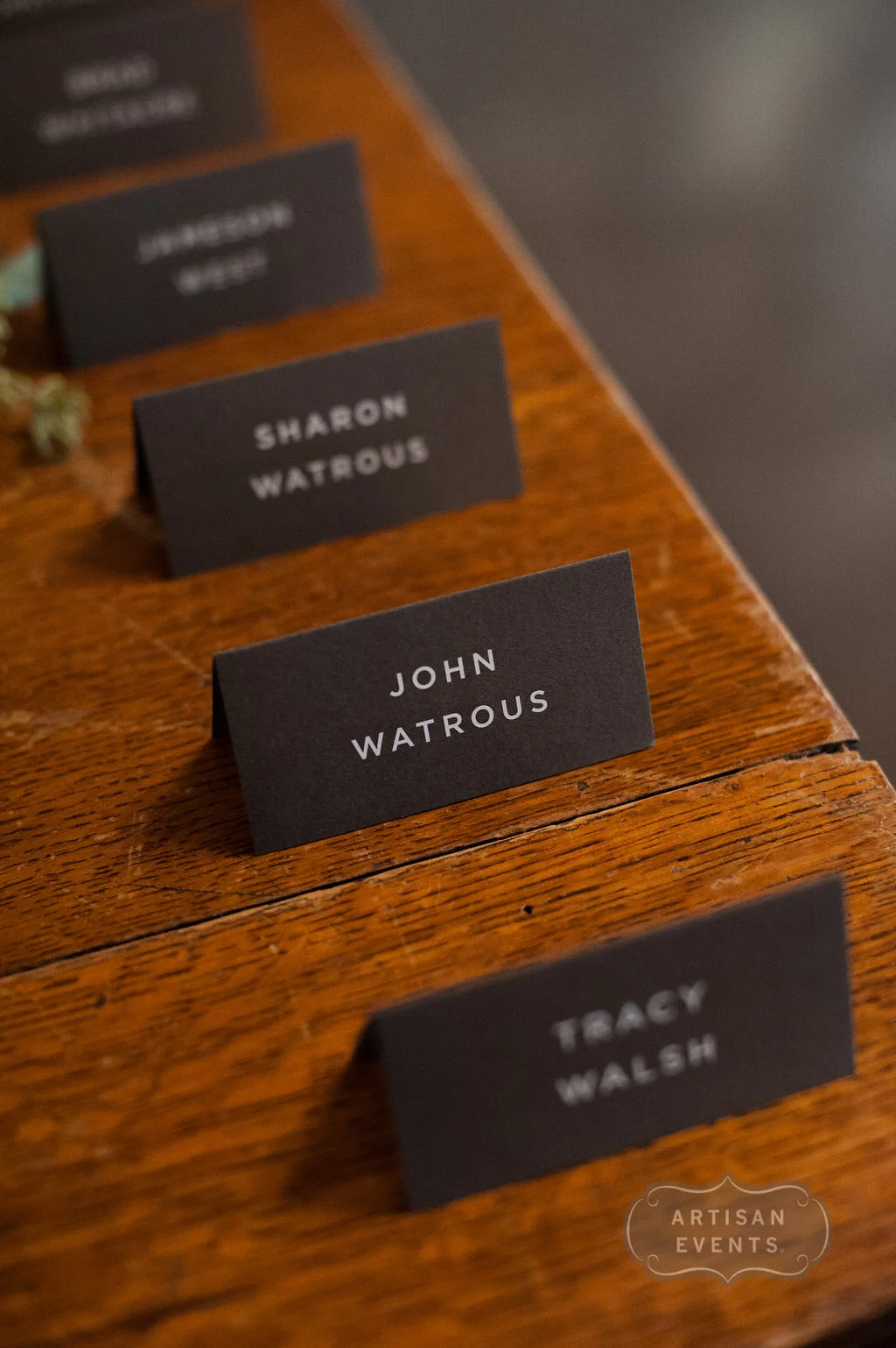 Grey Escort Card Display at Artifact Events