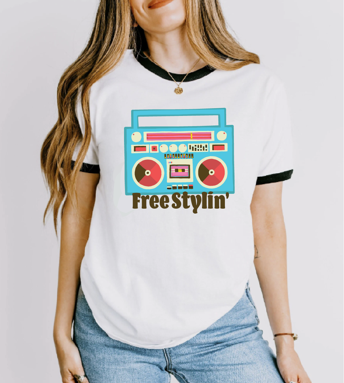 women wearing lysa flower t-shirt with a blue boombox logo design that has text that says free stylin.png