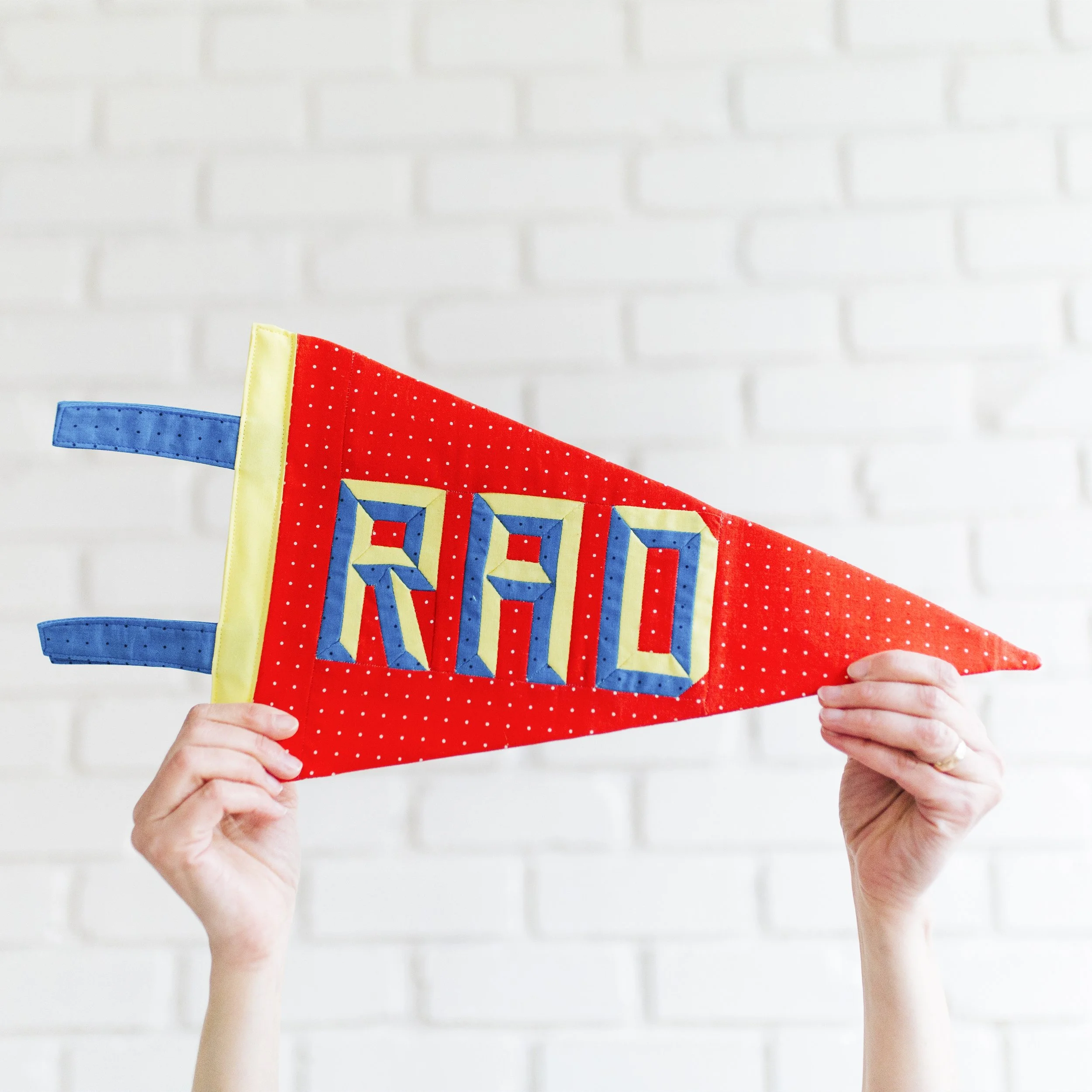 LysaFlower designed-rad PENNANT, red blue and yellow.jpg