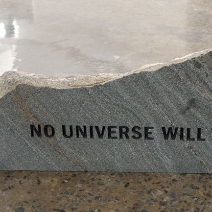 Monument I (Universe), Engraved and painted stone boulder, 16 x 38 x 10 in, 2017.
