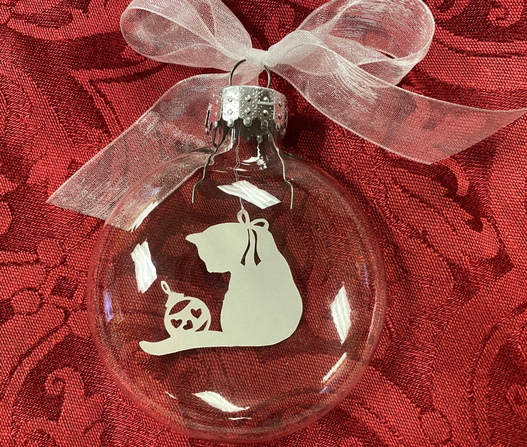 Cat with tree ornament