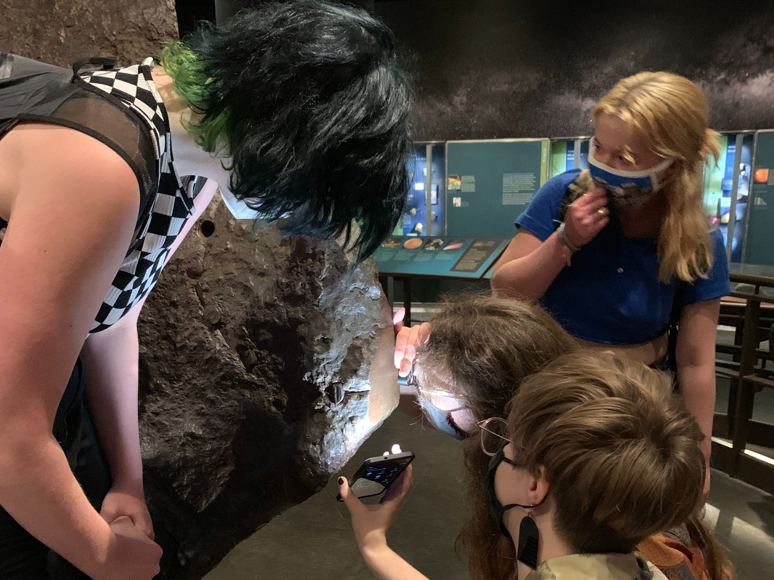 Checking out meteorites at the American Museum of Natural History.