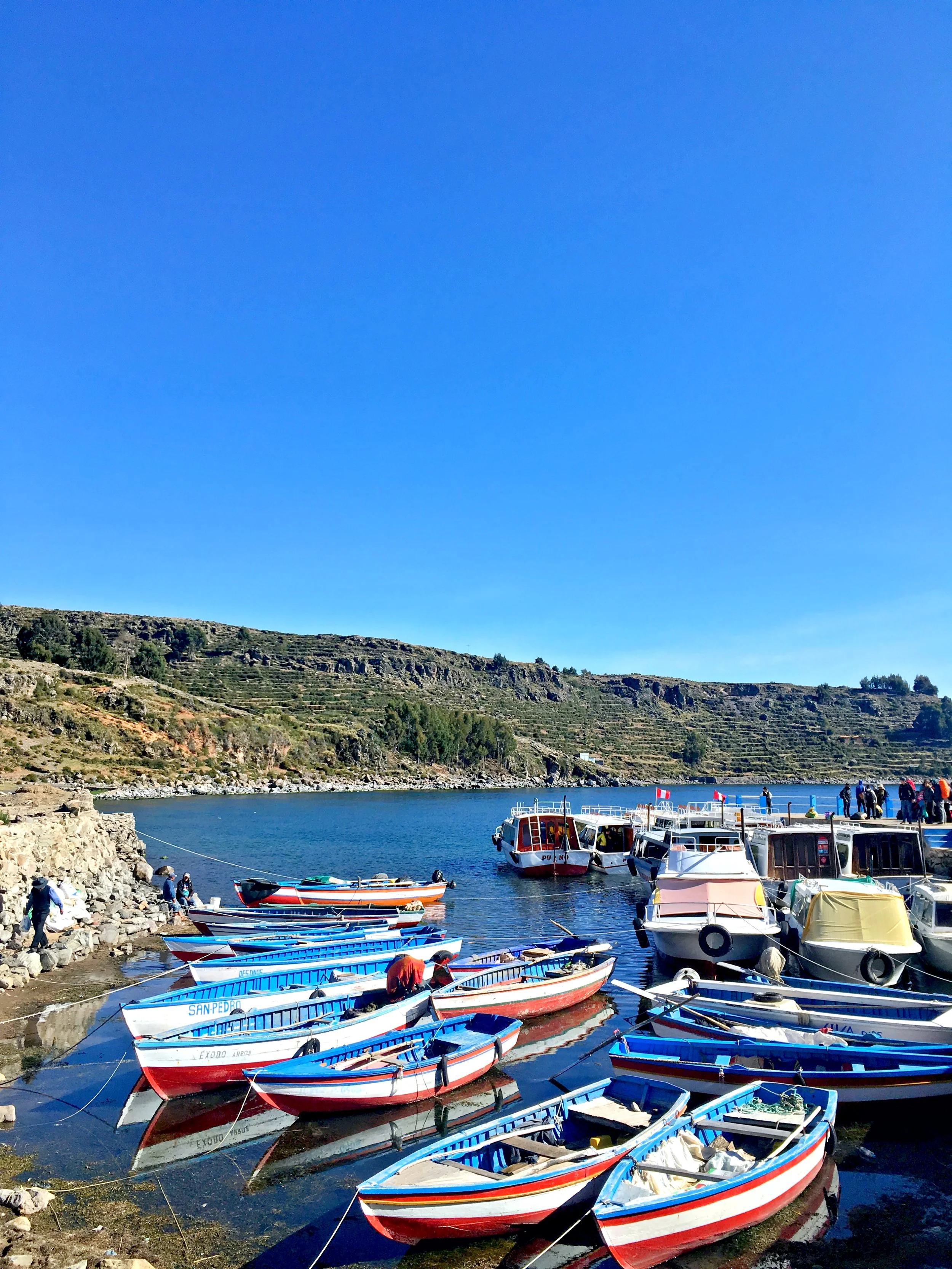 Boats docked on Amantani Island