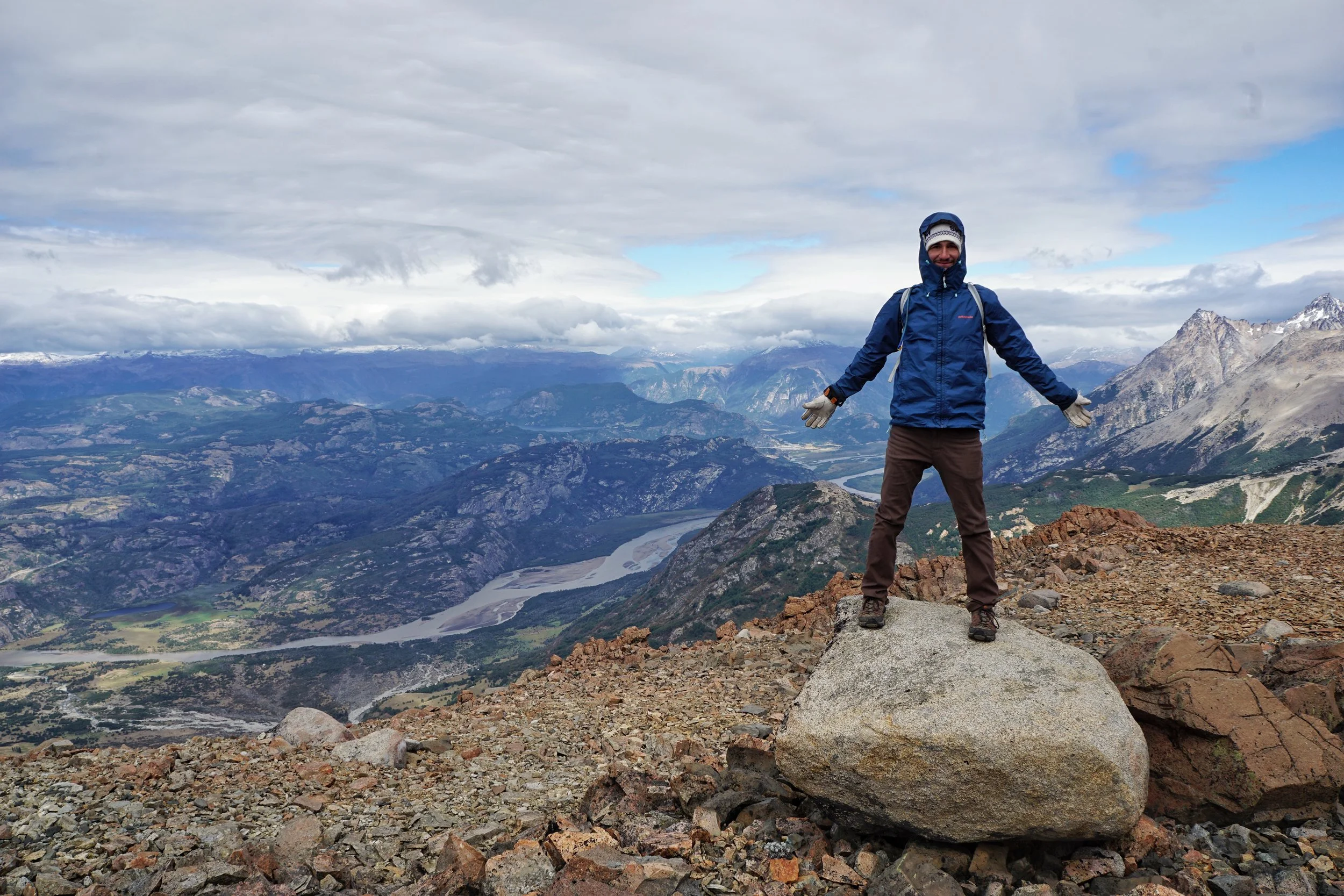 Embracing a break in the wind attop the pass