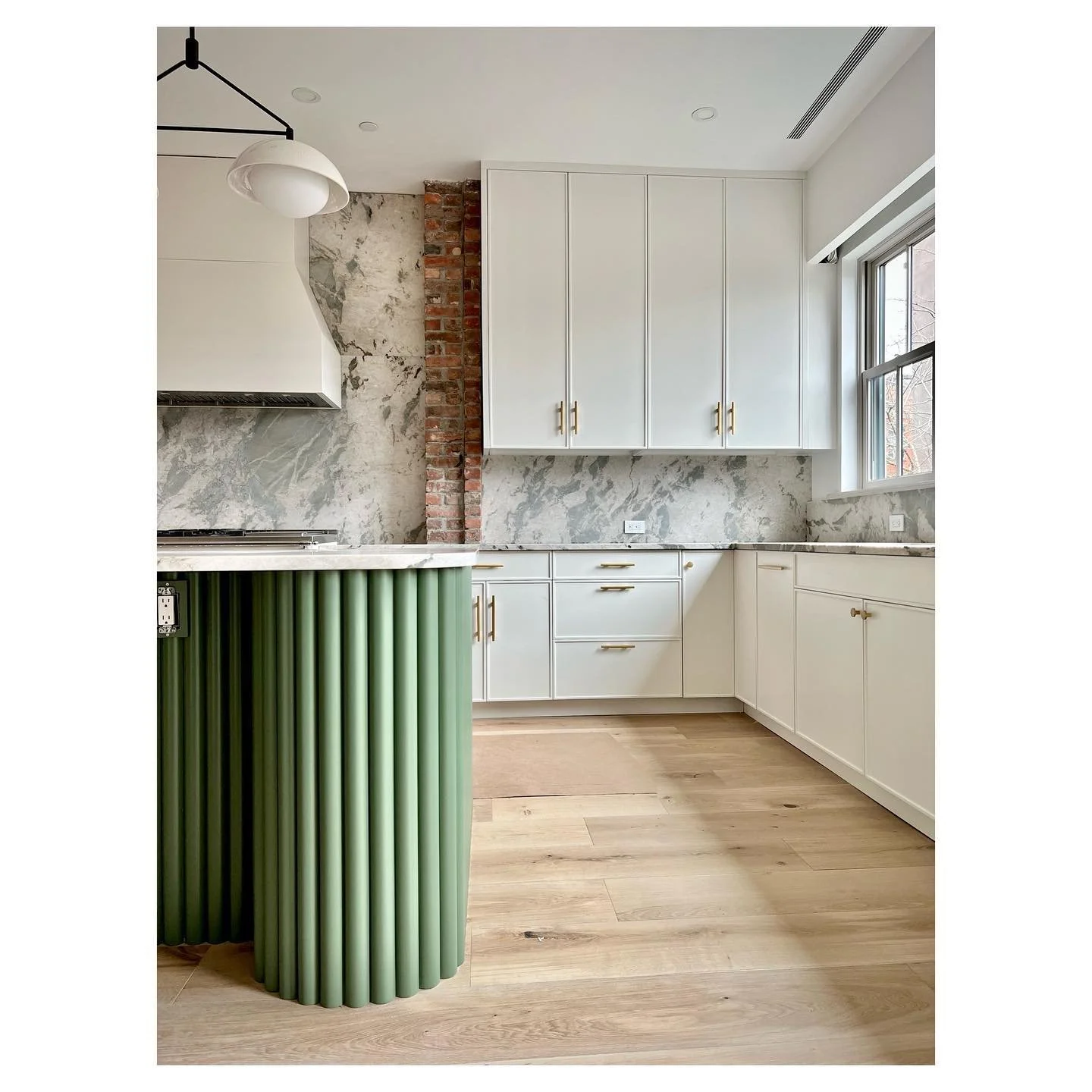 Almost complete for the holidays!  Custom cabinetry, Moon Ray quartzite + original brick columns to honor her start. 💚 🌚 🧱 

#exposedbrick #greenkitchen #moonrayquartzite #brooklynkitchen #quartzitecountertops #humpday