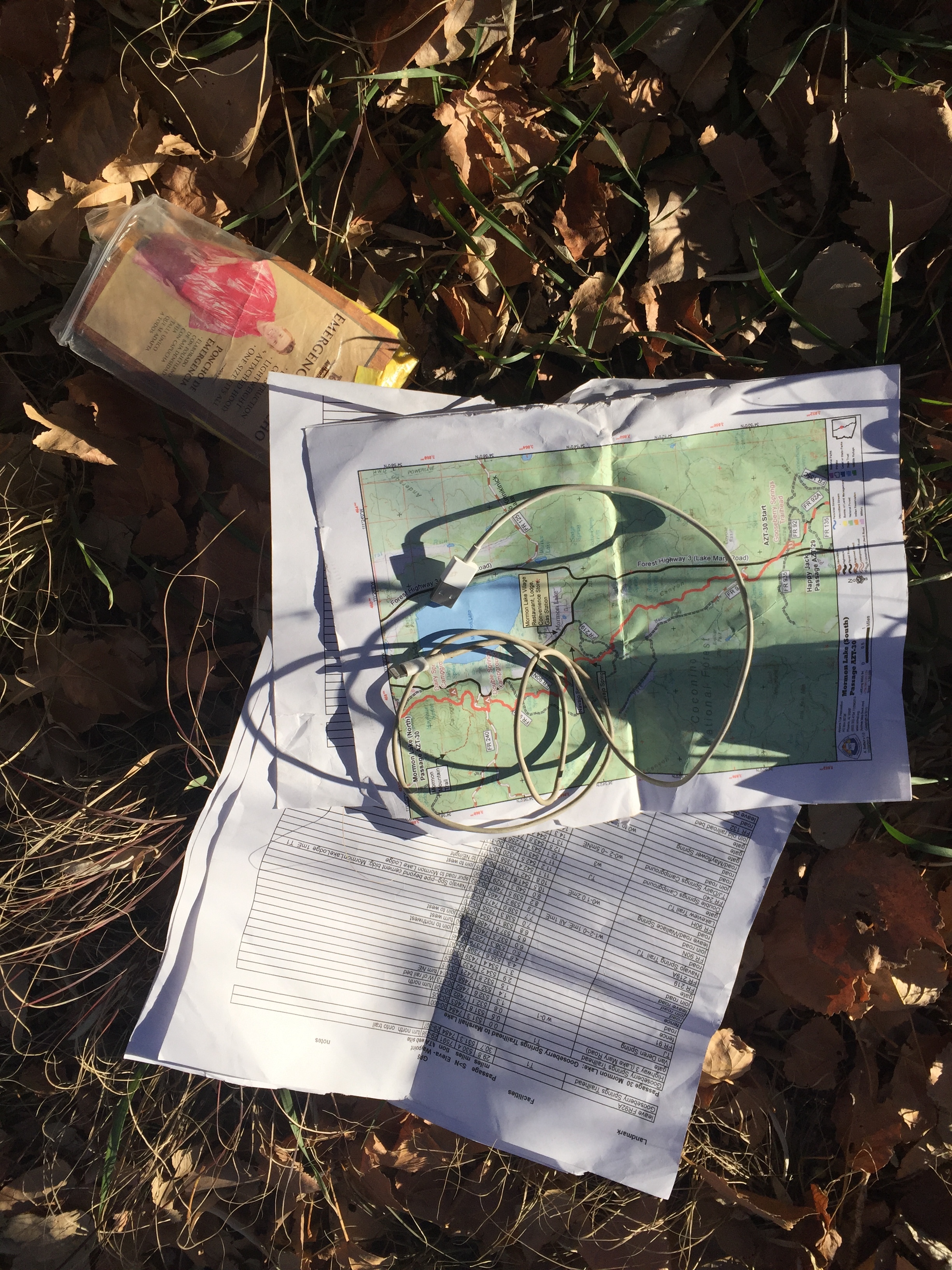 In the smaller slit pocket on the main frame bag I kept my printed AZT maps of the relevant passages (don't rely only on GPS for navigation folks. Just don't.) and the printed turn book. Maps and turn book can be downloaded in the members only area of the AZT website . If you plan on doing all or part of the AZT, or just want to support the care and maintenance of the trail, a membership is well worth the $35/year. I also had an emergency poncho. No rain of any kind was in the forecast, but its always good to have a "just in case" weather proofing item. My phone charging cord was stored in this pocket along with my phone (not pictured because it was taking the picture.) and my solar battery charger (also not pictured because on the last day I clipped it to my pack to try to charge it with the sun and it fell off. Boo!) 