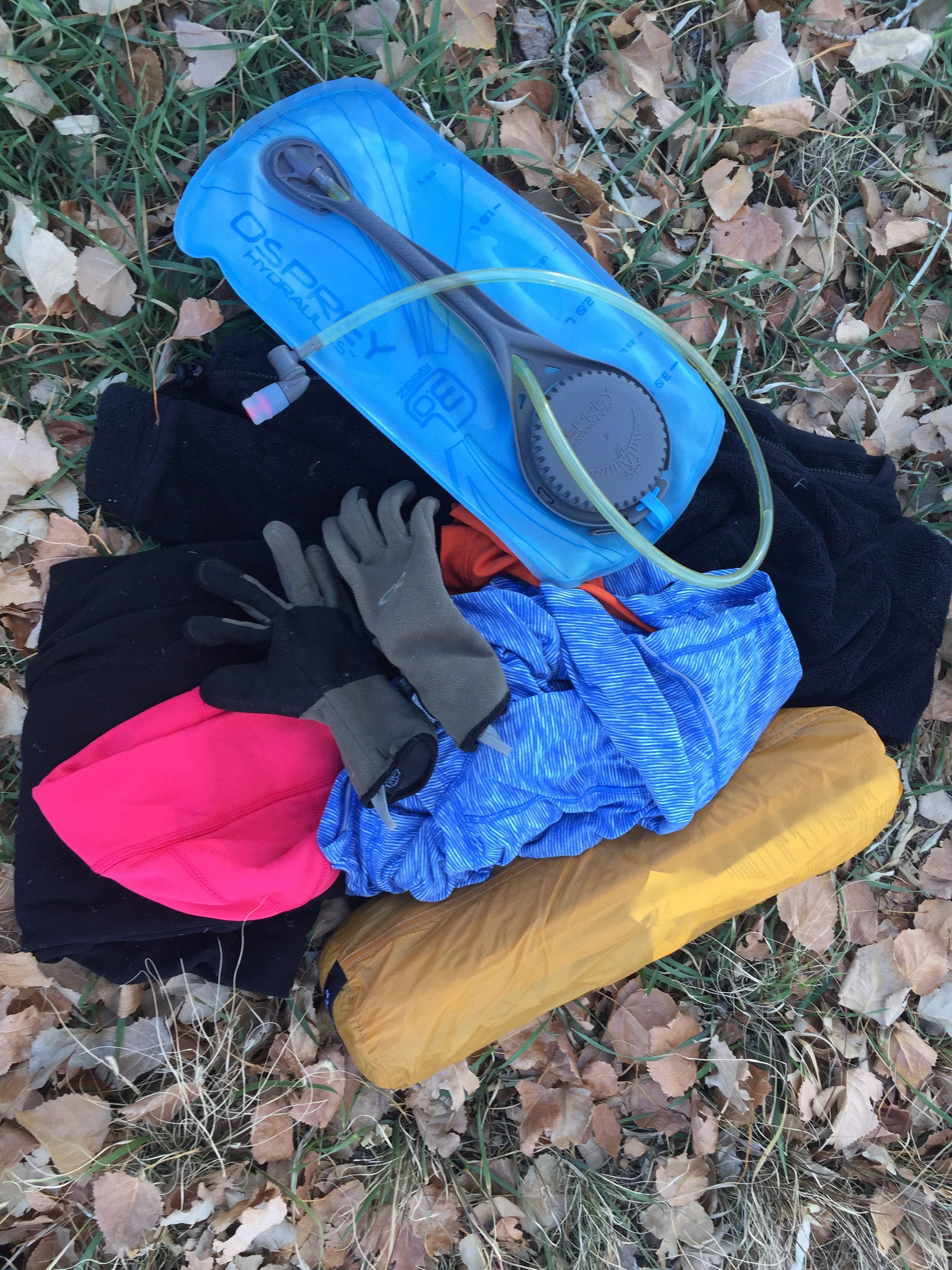 Finally, in the main compartment of my pack I carried my Big Agnes Fly Creek Ultralight ten t, my primary water reservoir, and my extra clothes. Clothing is one of the easiest places to save space and weight in the backcountry. For this trip, I carried warm pants and long johns for sleeping and around camp, a hat and gloves, wool socks for around camp, a jacket and vest, one spare shirt, and undergarments. I wore the same pants to ride each day, and carried the spare shirt so that I wouldn't have to sleep in a shirt that was wet from sweat. The other warm layers were to pile on if and when I got cold. There was nothing that I didn't wear at some point and most things were worn repeatedly. No one is judging the freshness of your threads out there. No need to bring a whole wardrobe. (It should be noted that I chose to wear normal running tights and not a chamois for various reasons. Ladies, I would not recommend wearing a dirty chamois for obvious sanitary reasons.) 