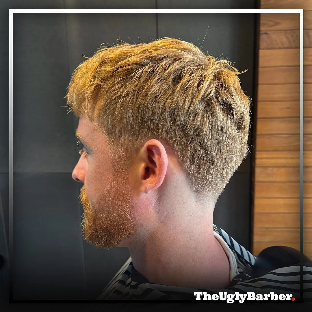 ✂️ Transform your thick locks with a classic haircut at #TheUglyBarber! 🌟 Witness the magic as we tame and style your mane into a sleek and sophisticated look. Join the #ThickHairTransformation and redefine your style with confidence. 💈✨ #ThickHair