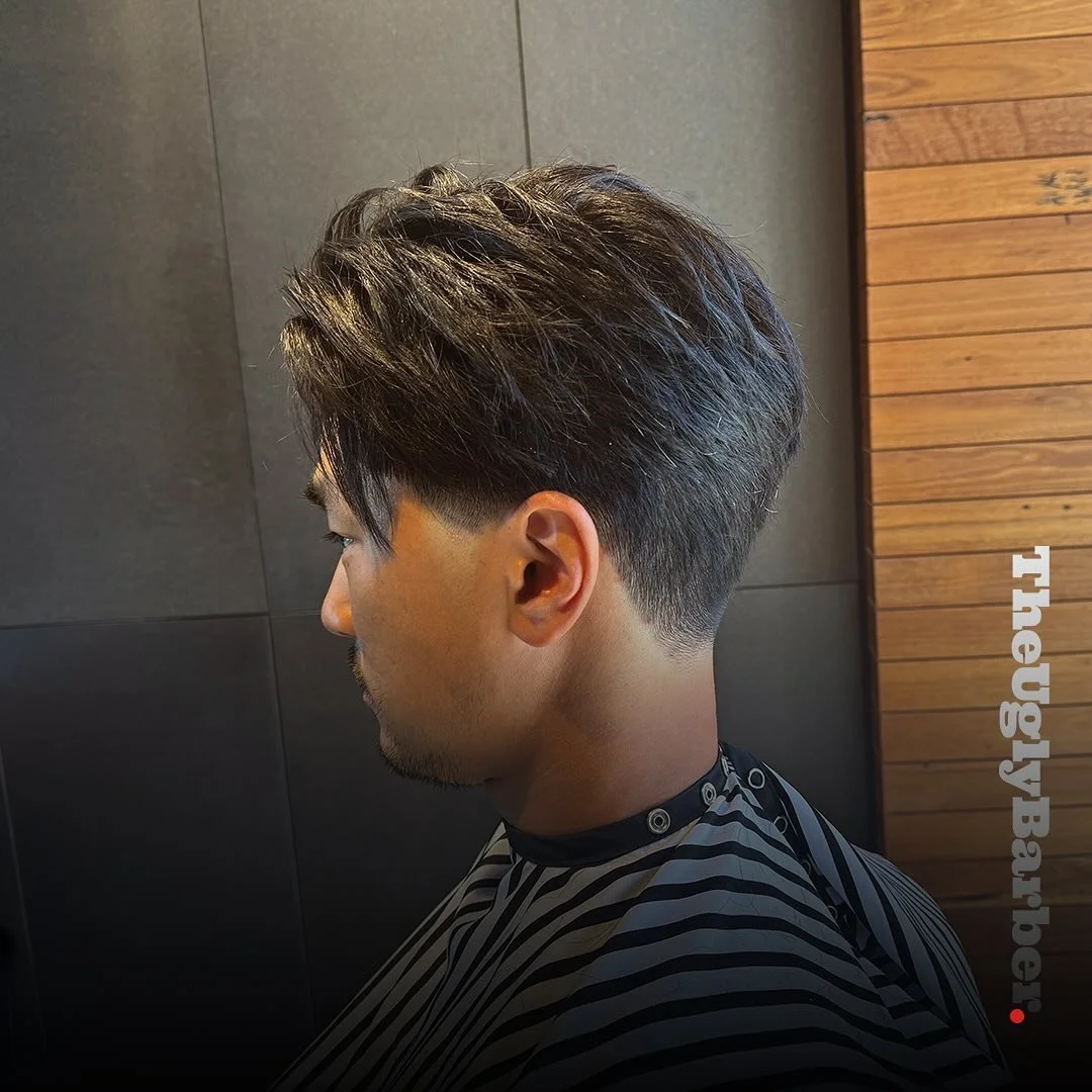 ✂️ Get sleek and sharp with a straight hair cut at #TheUglyBarber! 🌟 Embrace the clean lines and timeless style that define this classic look. Join the trend and let your hair do the talking. #StraightHairCut #SleekStyle #BarberingEssentials #HairGo