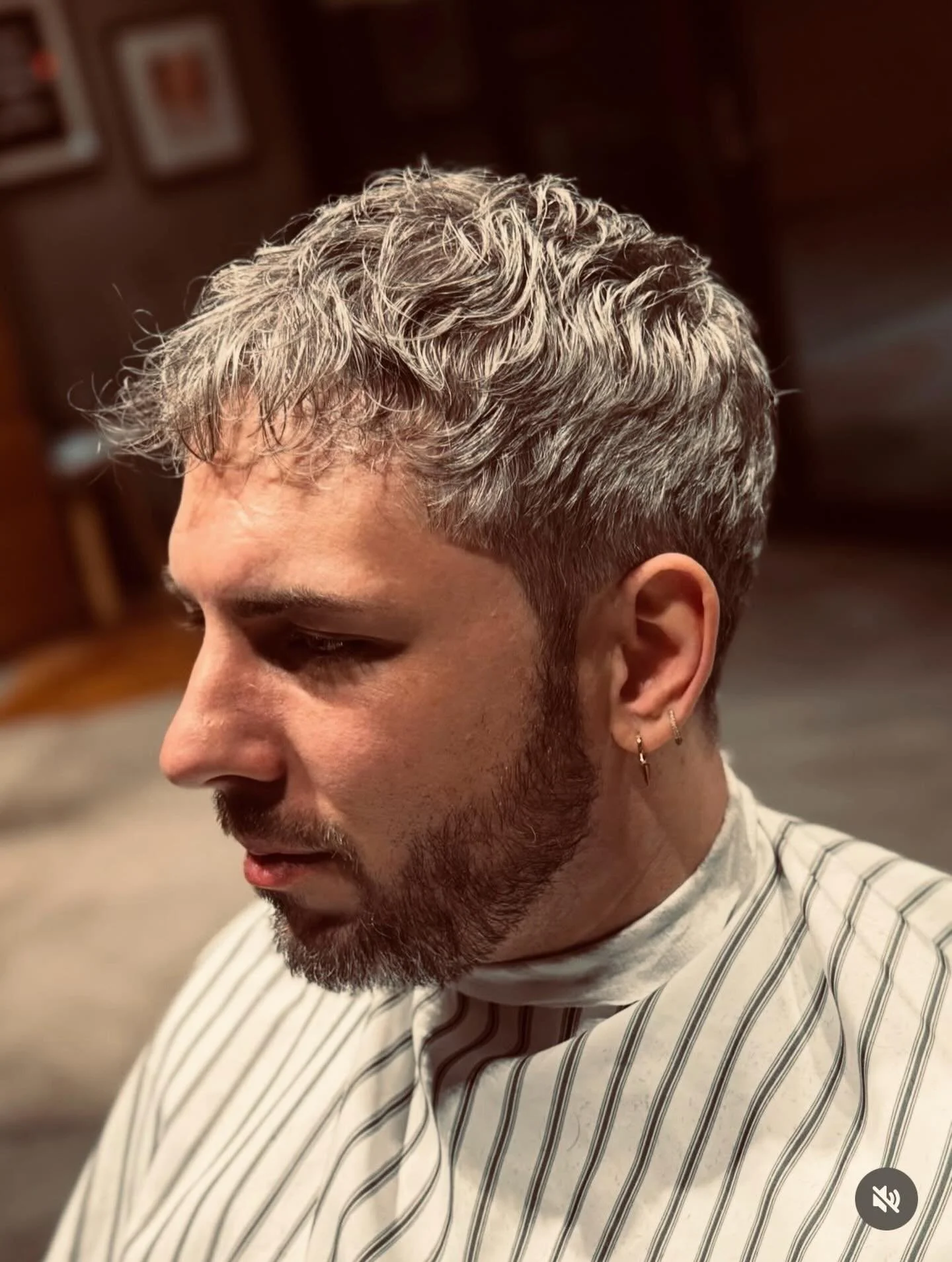 Short, blended sides. Textured waves up top. Clean, effortless and proof that not every silver strand needs a meeting with the dye. Natural grey done right has character. We just gave it the haircut it deserves.